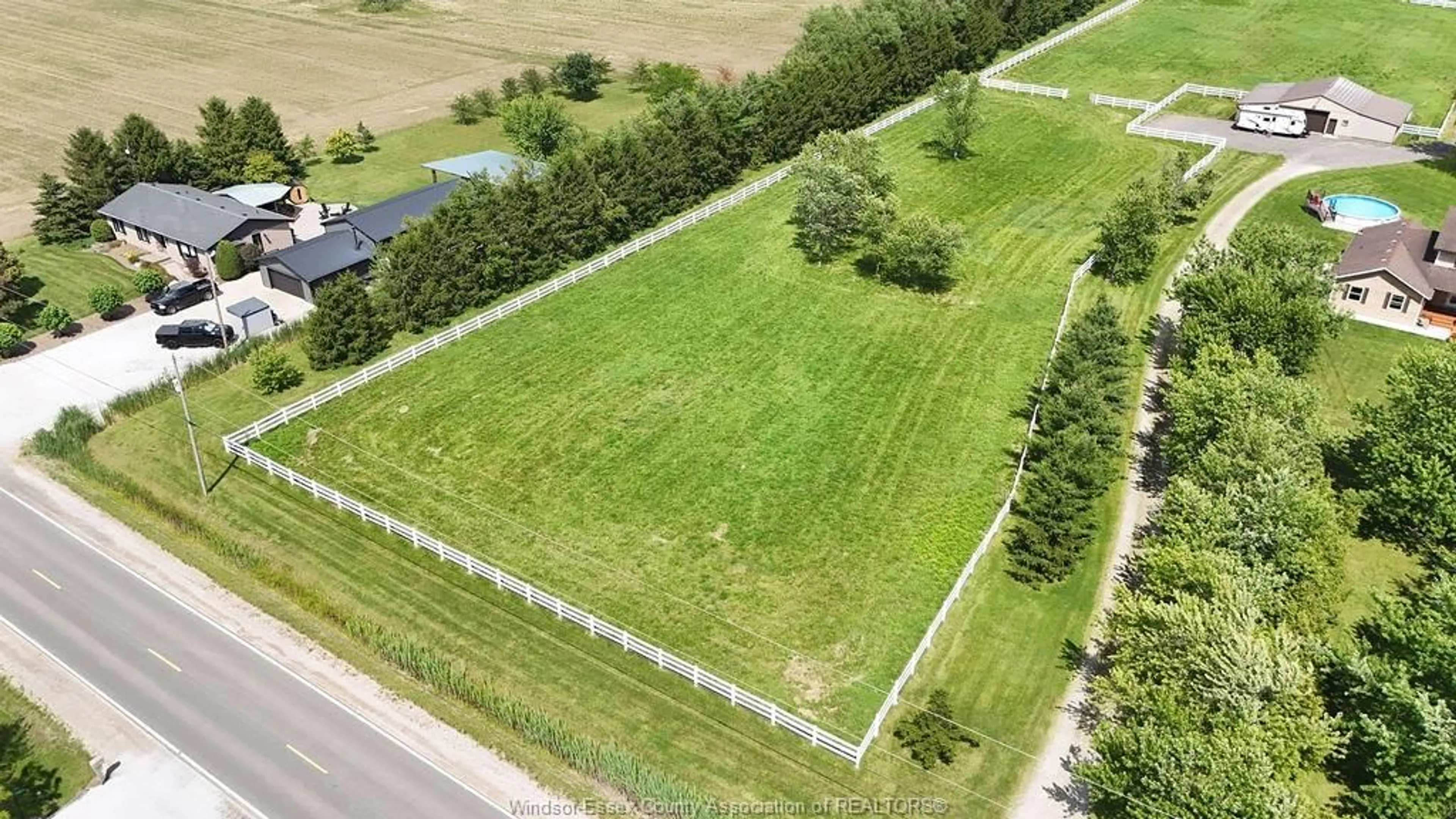 A pic from outside/outdoor area/front of a property/back of a property/a pic from drone, street for 1420 COUNTY RD 31, Lakeshore Ontario N0R 1S0
