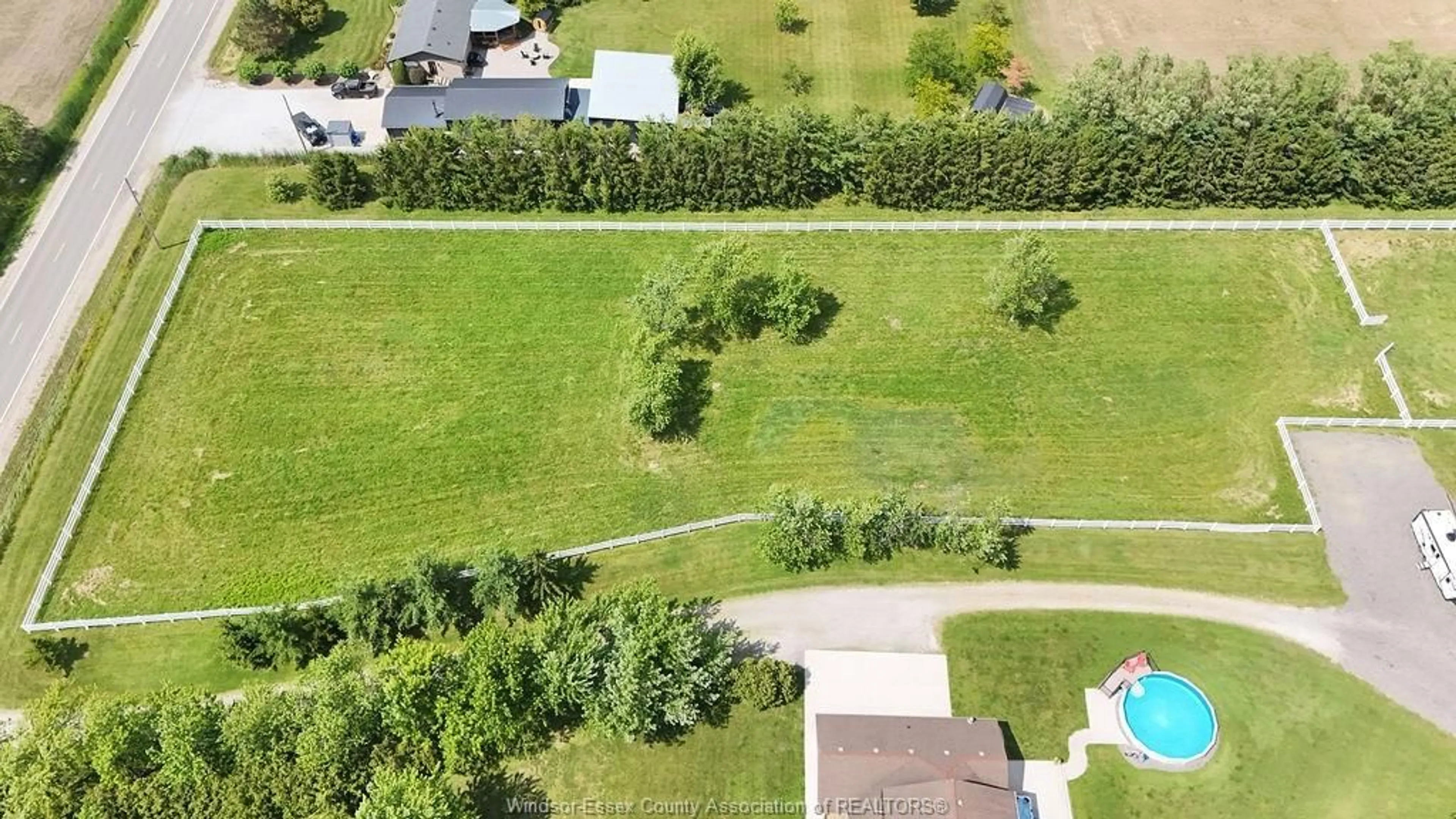 A pic from outside/outdoor area/front of a property/back of a property/a pic from drone, forest/trees view for 1420 COUNTY RD 31, Lakeshore Ontario N0R 1S0