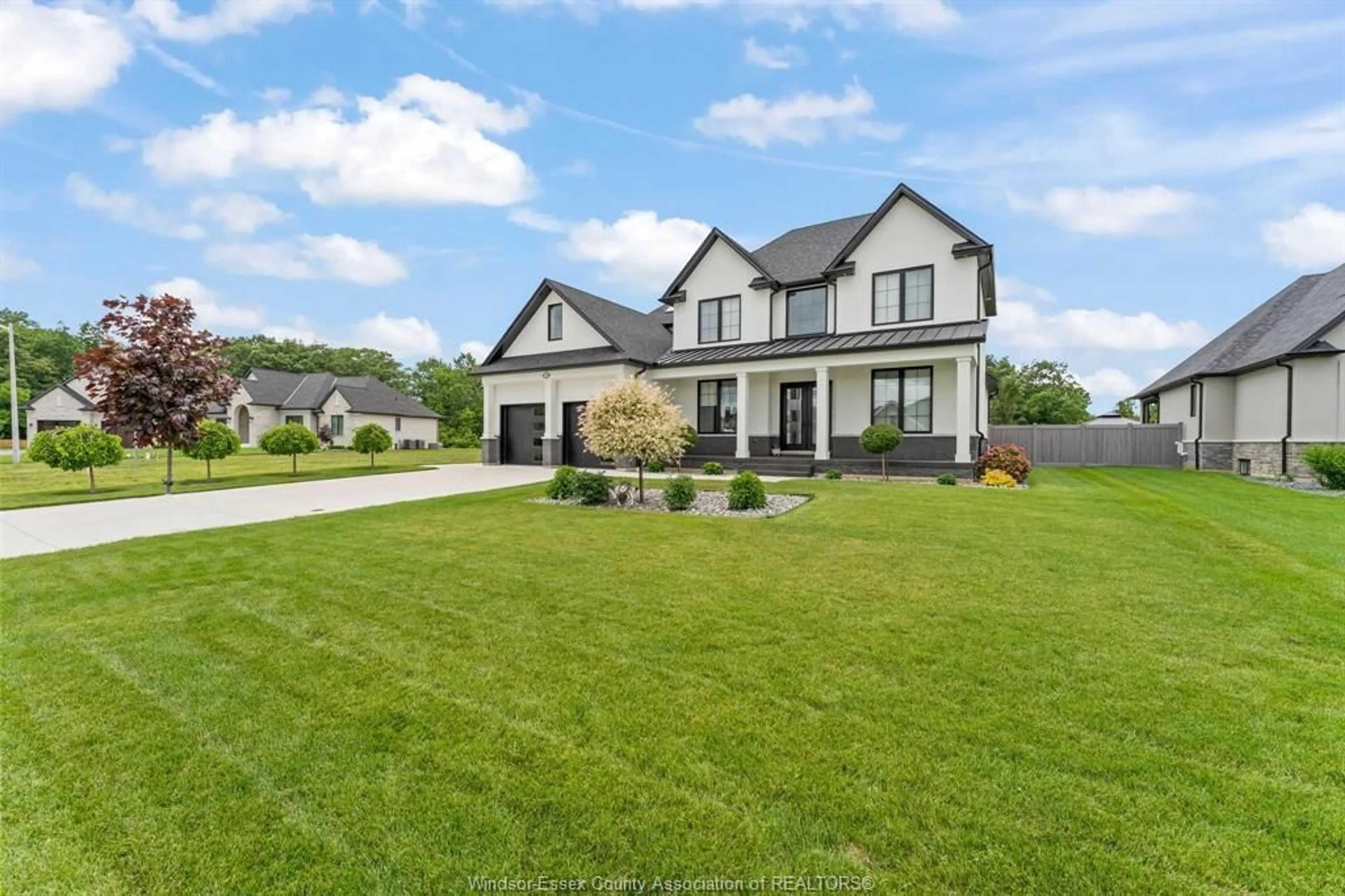 Home with brick exterior material, street for 16 YORK Blvd, Kingsville Ontario N9Y 0E5
