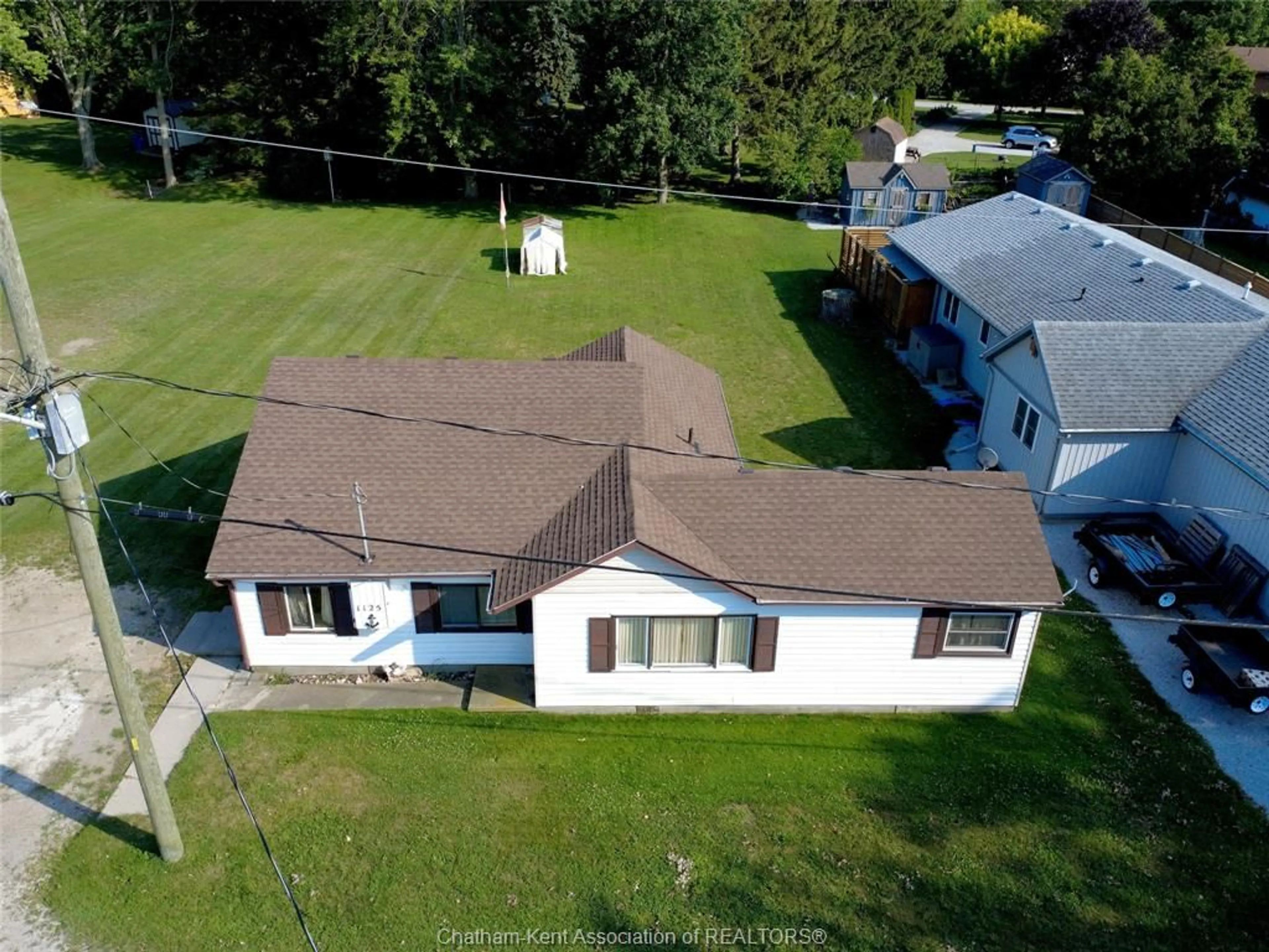 A pic from outside/outdoor area/front of a property/back of a property/a pic from drone, unknown for 1125 Kerr Ave, Erieau Ontario N0P 1A0