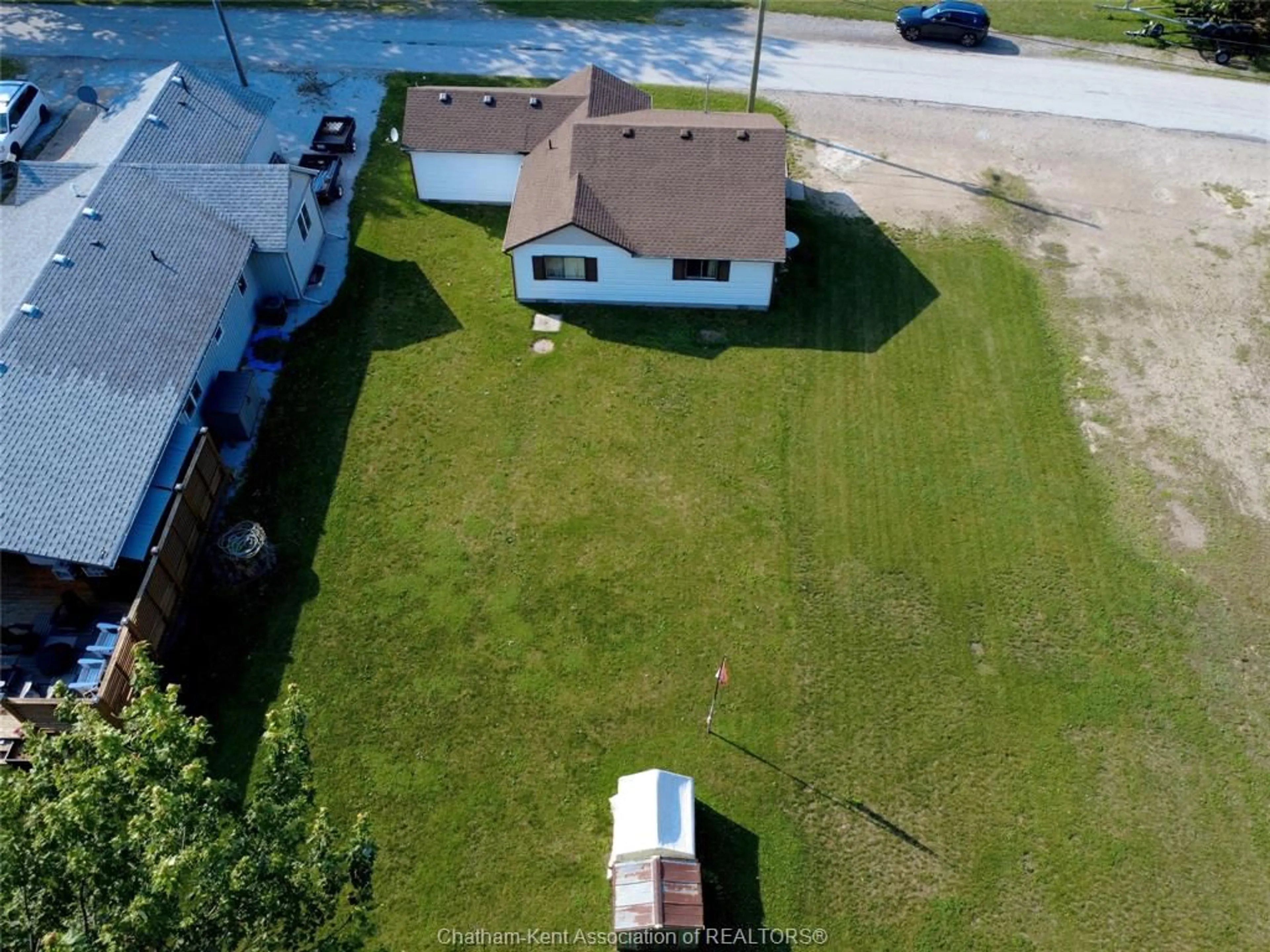 A pic from outside/outdoor area/front of a property/back of a property/a pic from drone, unknown for 1125 Kerr Ave, Erieau Ontario N0P 1A0