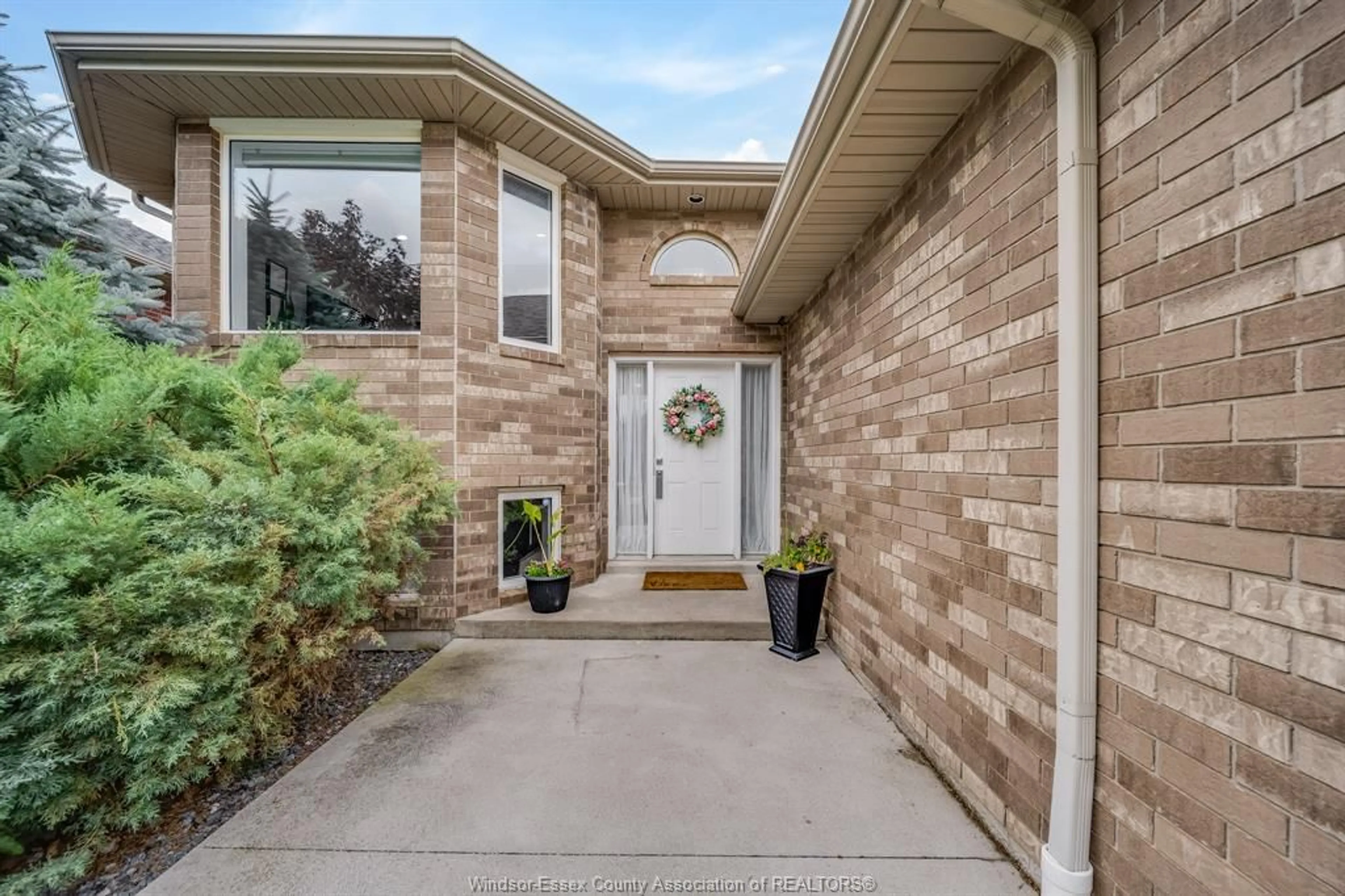 Home with brick exterior material, street for 1409 KATELLA Ave, Windsor Ontario N8P 1R4