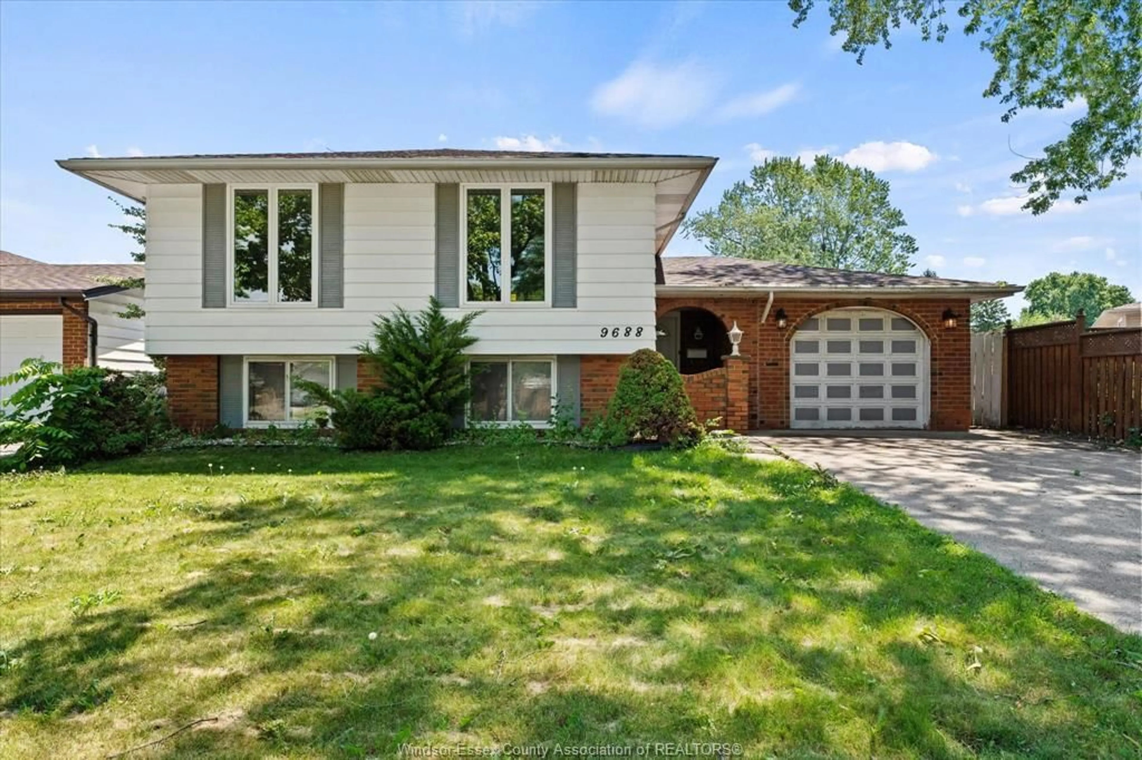Home with brick exterior material, street for 9688 CHESTNUT Dr, Windsor Ontario N8R 1G8