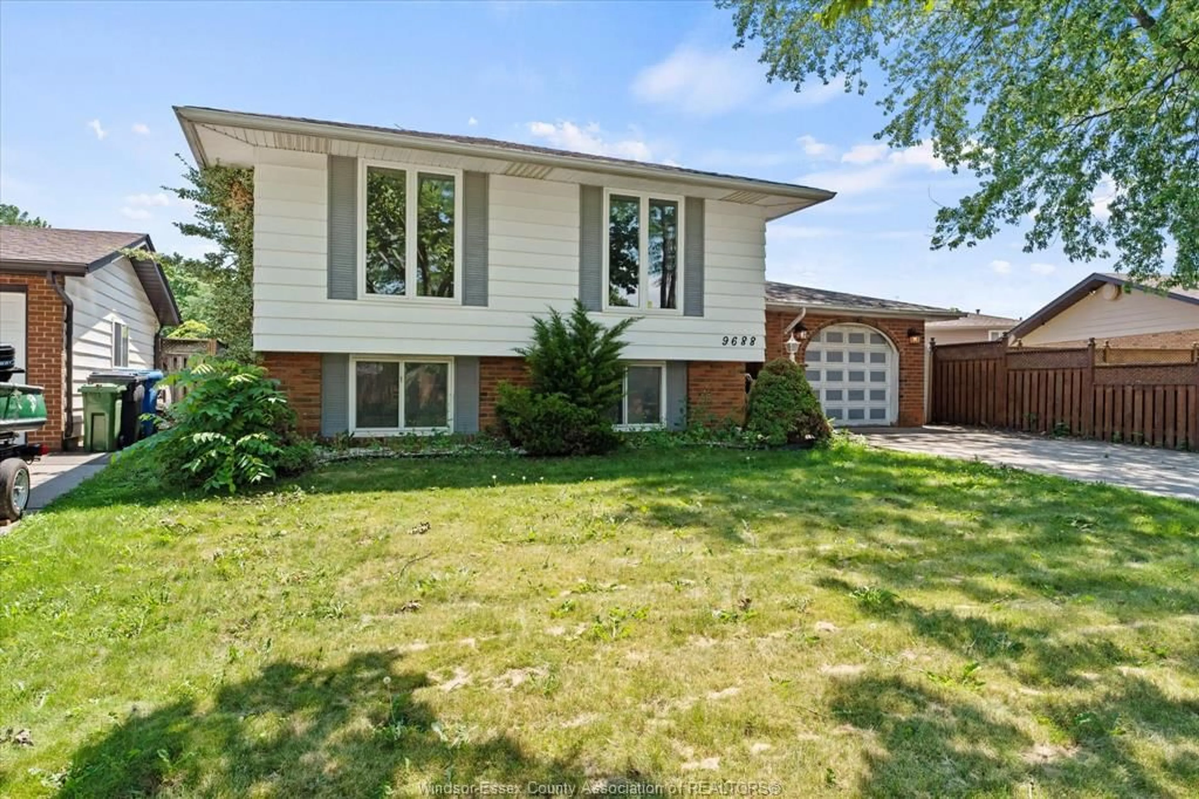 Home with brick exterior material, street for 9688 CHESTNUT Dr, Windsor Ontario N8R 1G8
