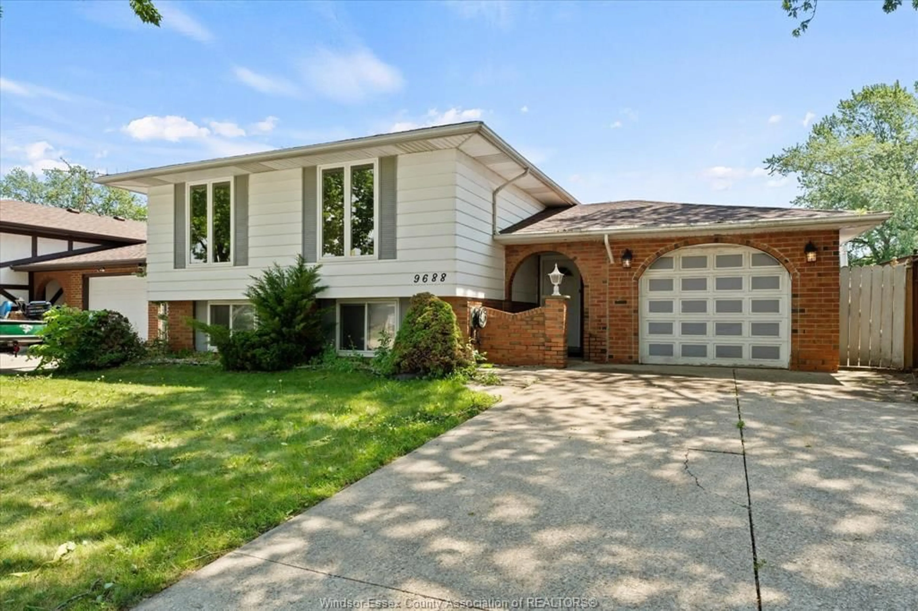Home with brick exterior material, street for 9688 CHESTNUT Dr, Windsor Ontario N8R 1G8