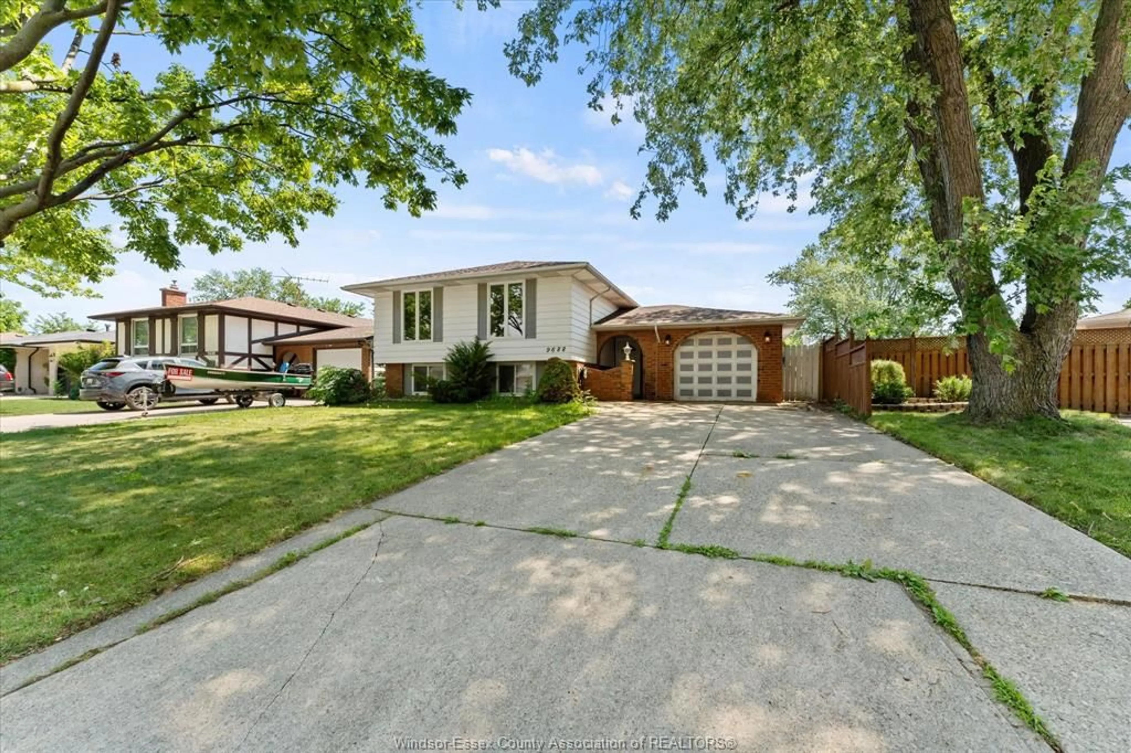 Home with brick exterior material, street for 9688 CHESTNUT Dr, Windsor Ontario N8R 1G8