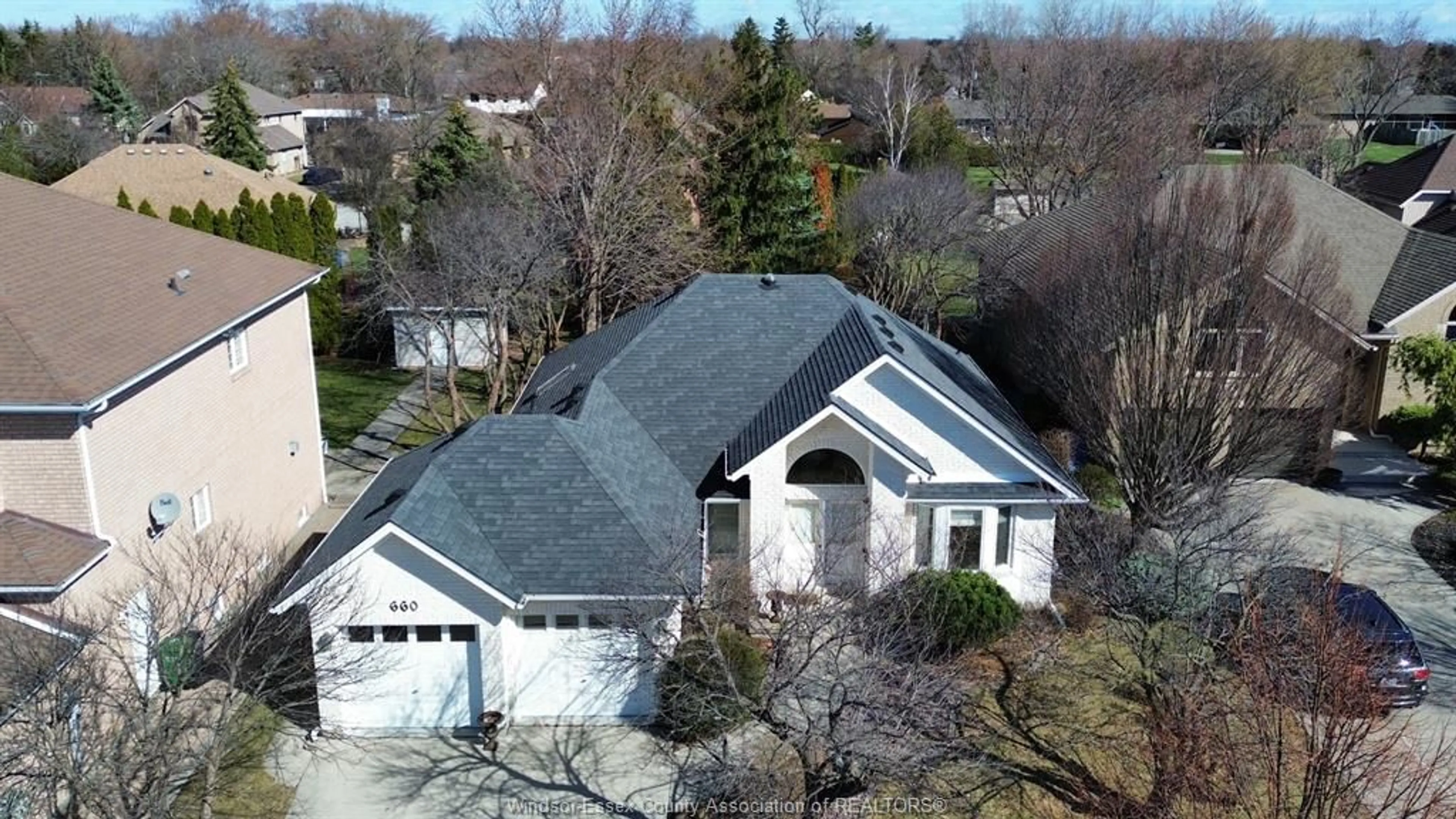 A pic from outside/outdoor area/front of a property/back of a property/a pic from drone, street for 660 CARUSO, Windsor Ontario N9G 2M6