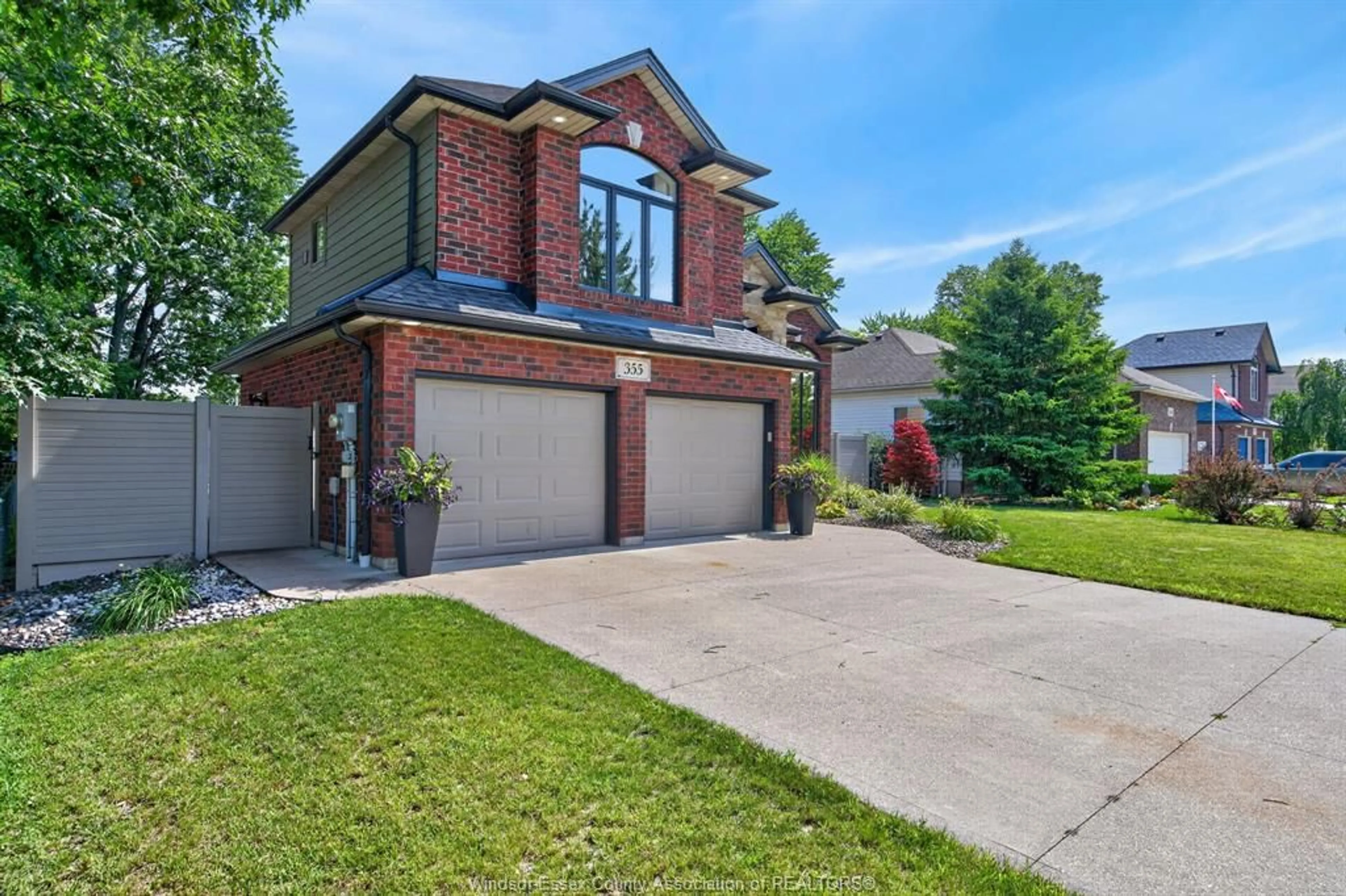 Home with brick exterior material, street for 355 SACRED HEART Dr, LaSalle Ontario N9J 1T1