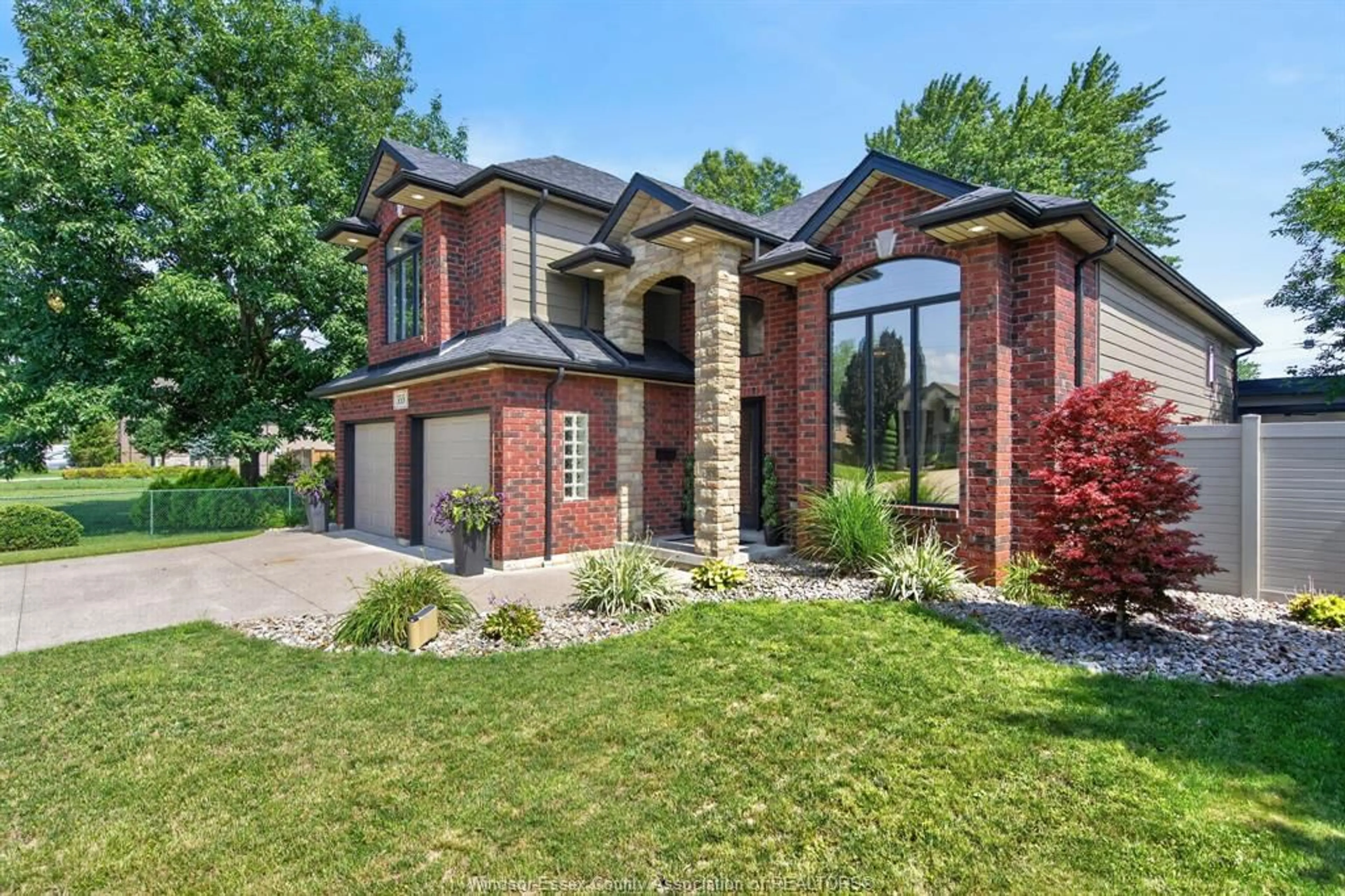 Home with brick exterior material, street for 355 SACRED HEART Dr, LaSalle Ontario N9J 1T1