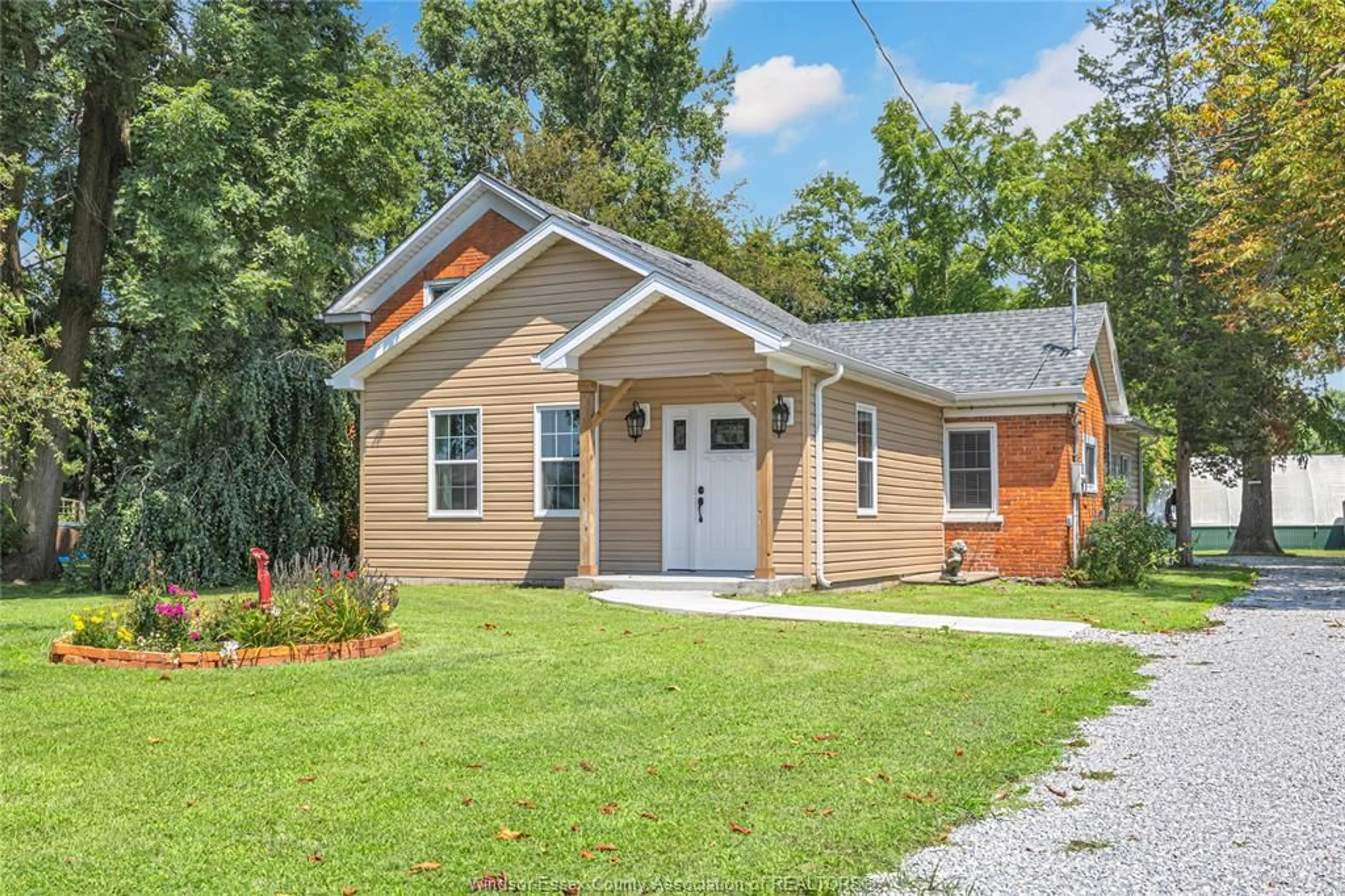 Home with brick exterior material, street for 458 COUNTY RD 34, Kingsville Ontario N8M 2X5