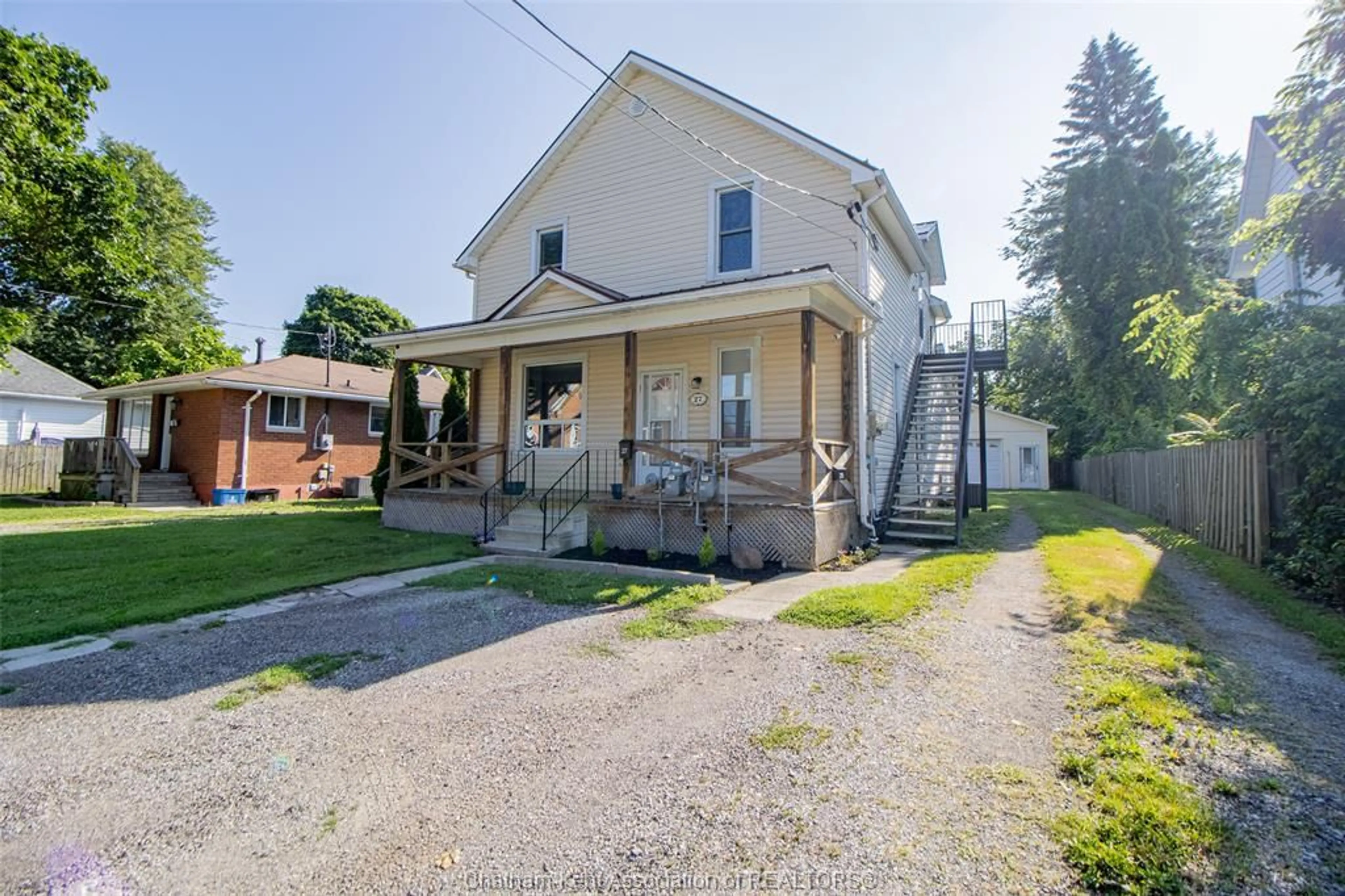 A pic from outside/outdoor area/front of a property/back of a property/a pic from drone, street for 27 - 27 1/2 Prince St, Chatham Ontario N7M 4N7