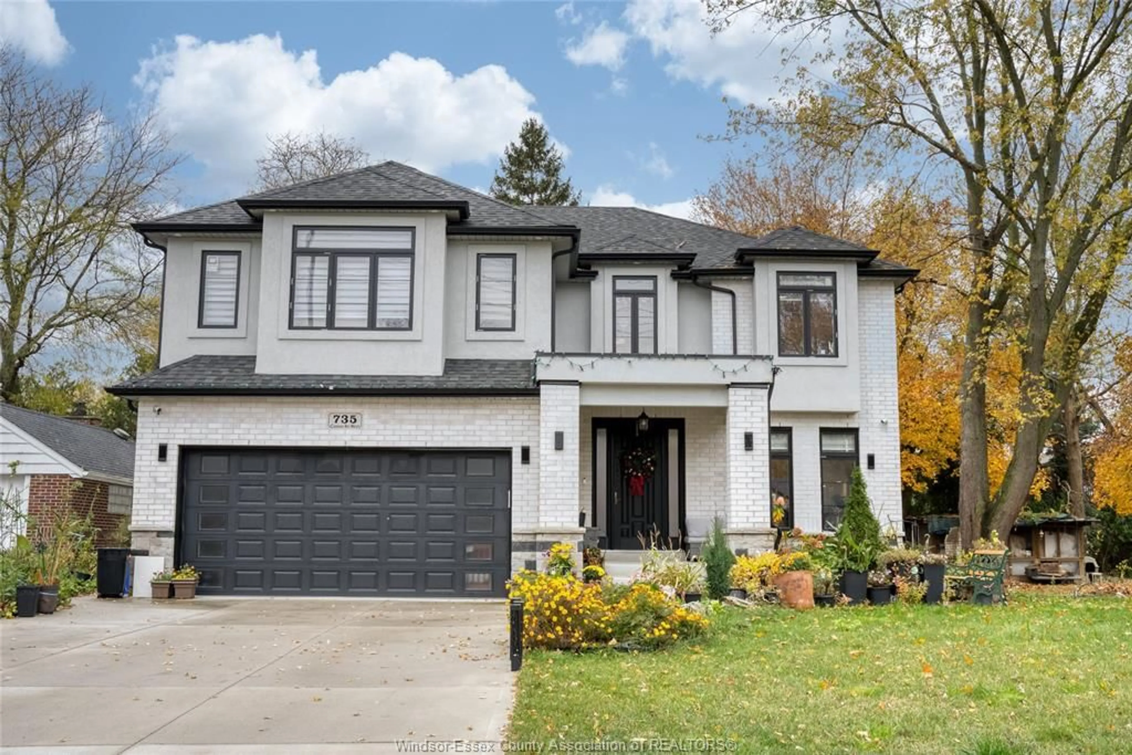 Home with brick exterior material, street for 735 CABANA Rd, Windsor Ontario N9G 1B5