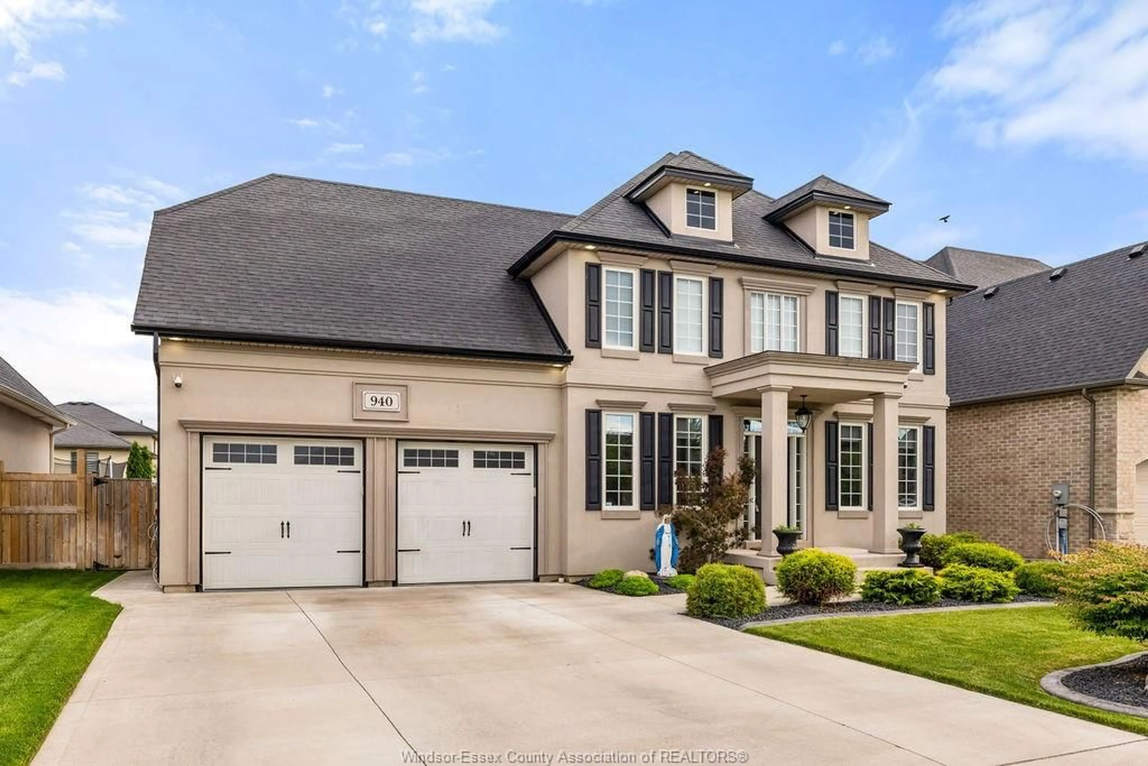 Home with brick exterior material, street for 940 WESTWOOD Dr, Lakeshore Ontario N0R 1A0