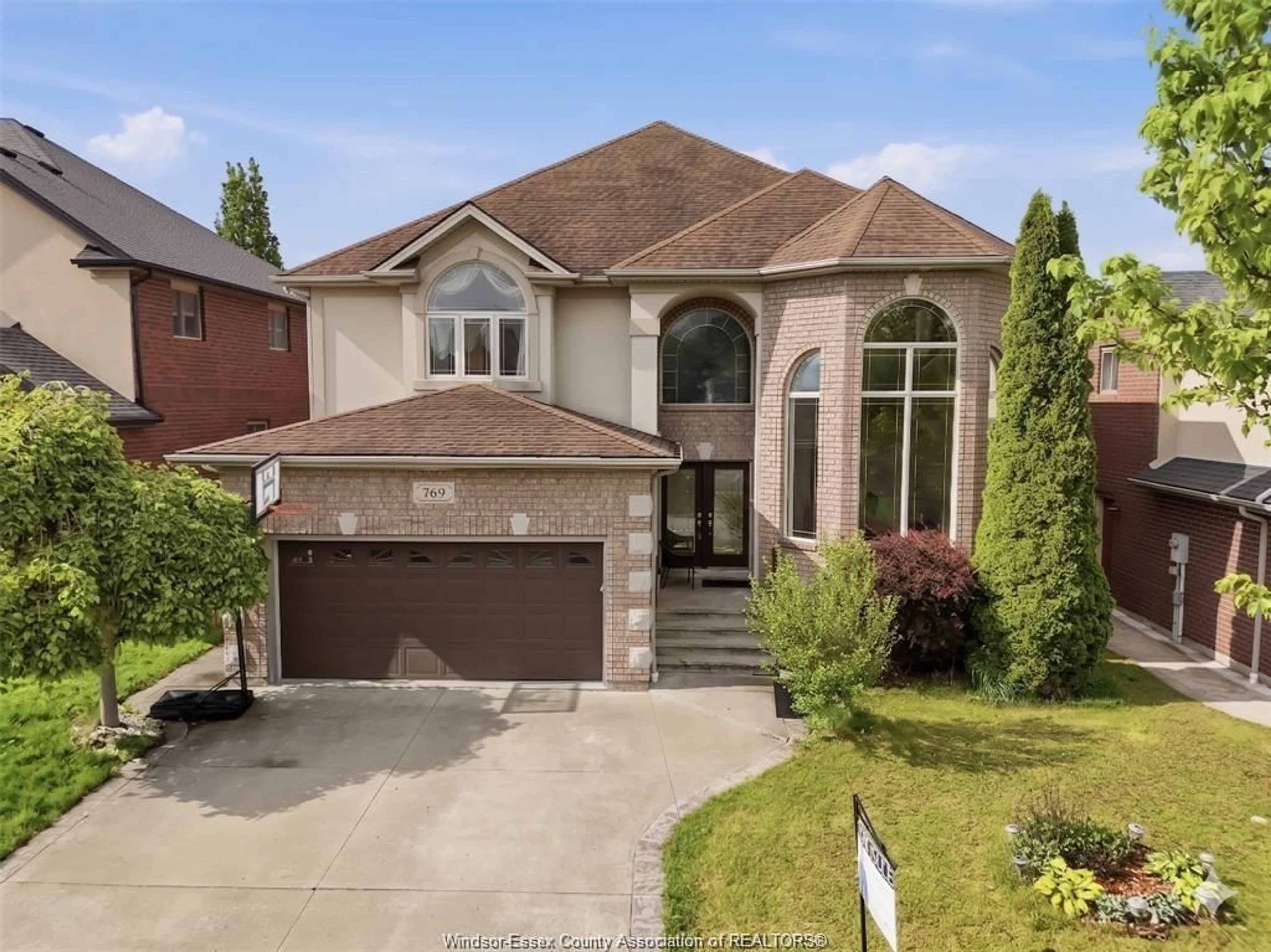 Home with brick exterior material, street for 769 MASSIMO Cres, Windsor Ontario N9G 3C7