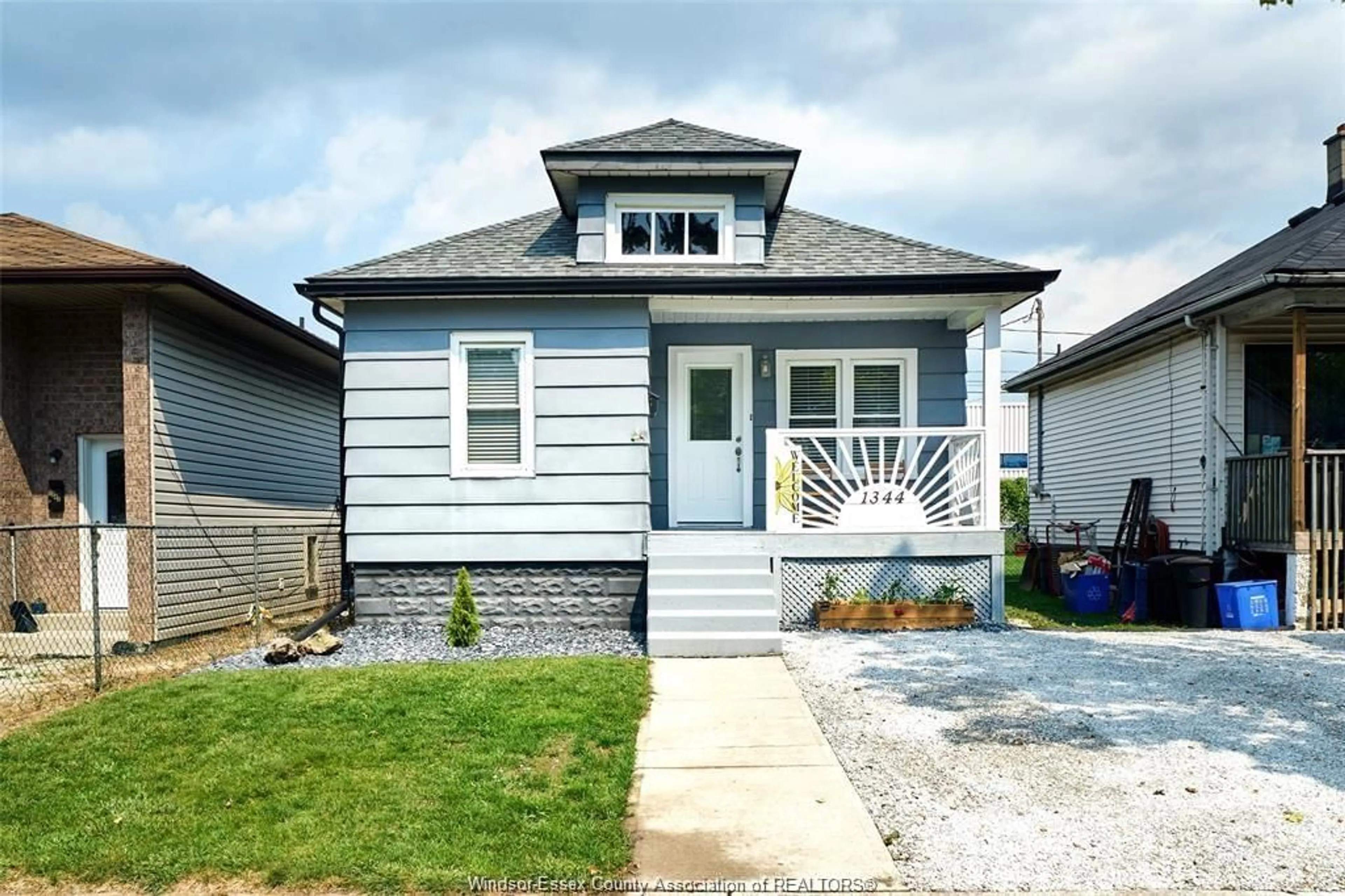 Home with vinyl exterior material, street for 1344 HENRY FORD CENTRE Dr, Windsor Ontario N8Y 2T8