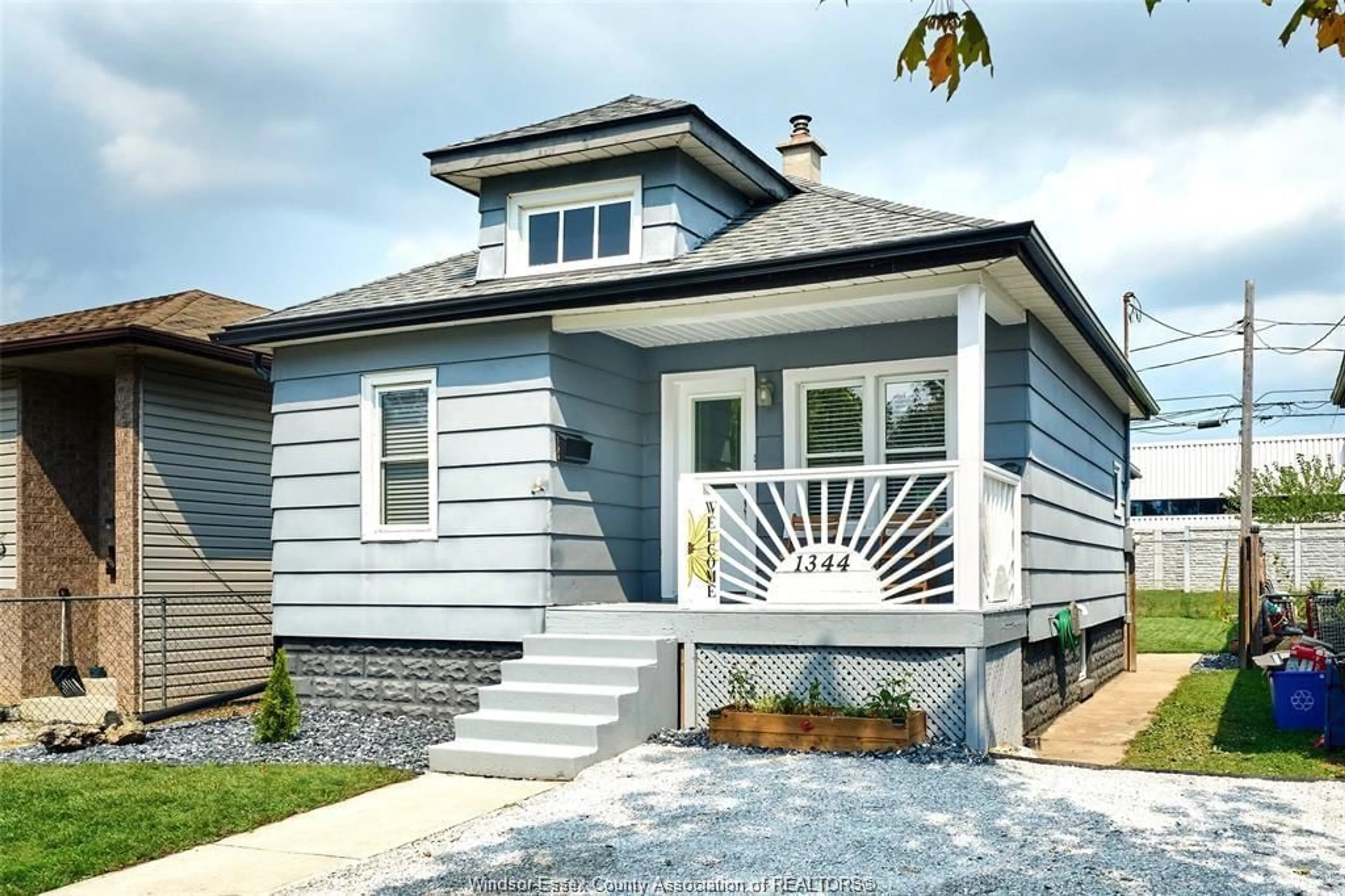Home with vinyl exterior material, street for 1344 HENRY FORD CENTRE Dr, Windsor Ontario N8Y 2T8