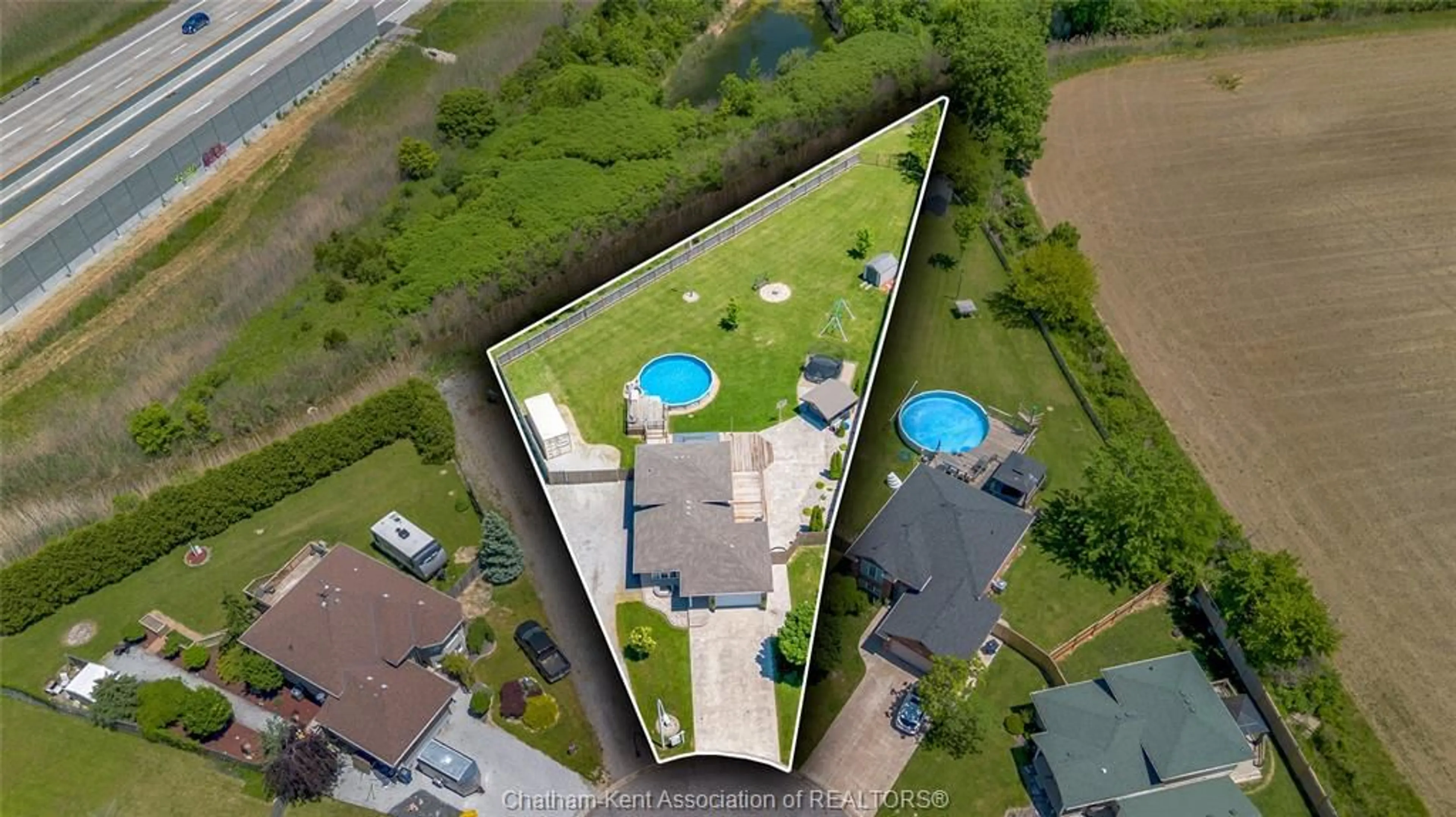 A pic from outside/outdoor area/front of a property/back of a property/a pic from drone, water/lake/river/ocean view for 67 Azar Ave, Tilbury Ontario N0P 2L0