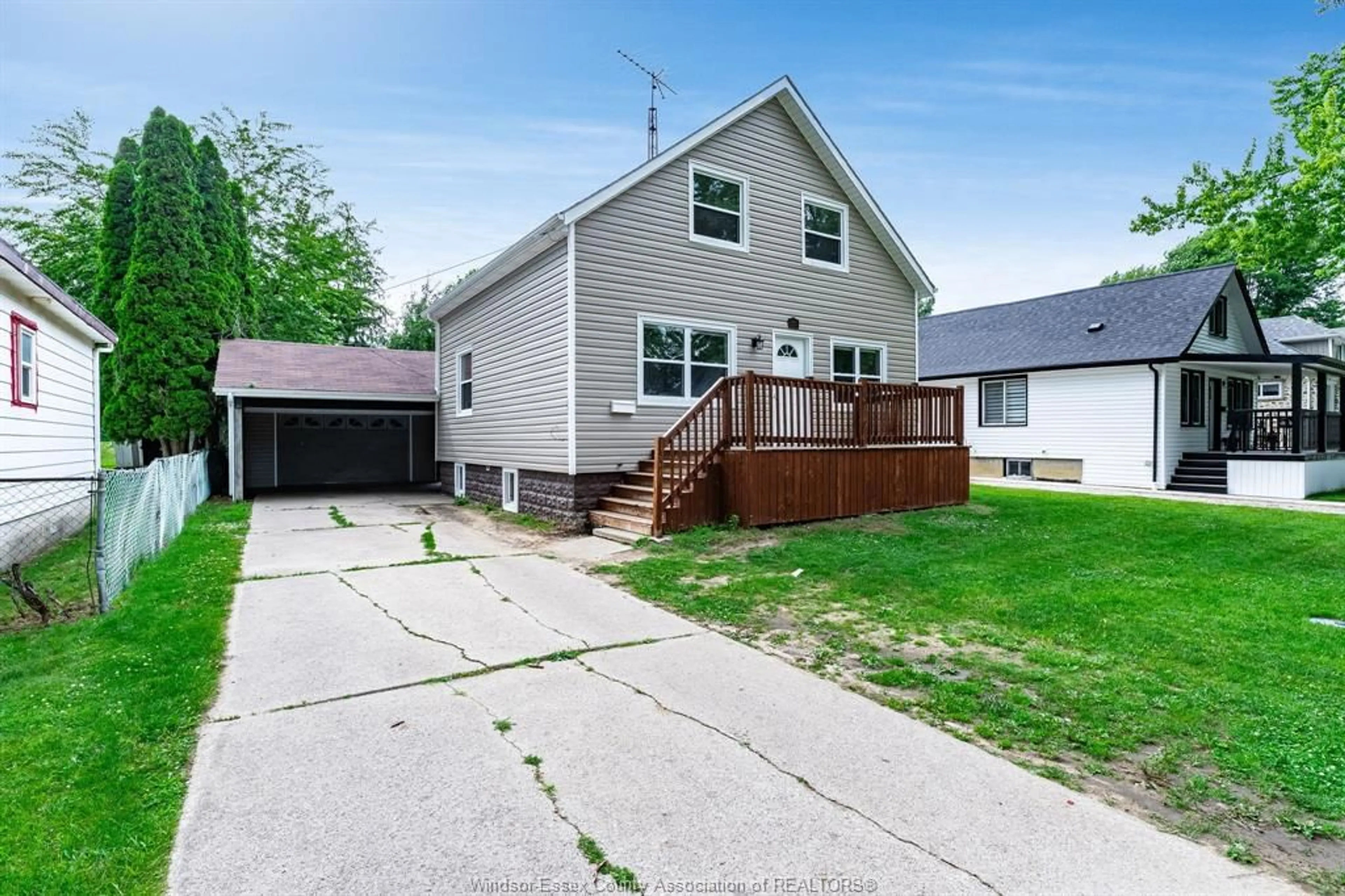 A pic from outside/outdoor area/front of a property/back of a property/a pic from drone, street for 13 Poplar St, Leamington Ontario N8H 3L3