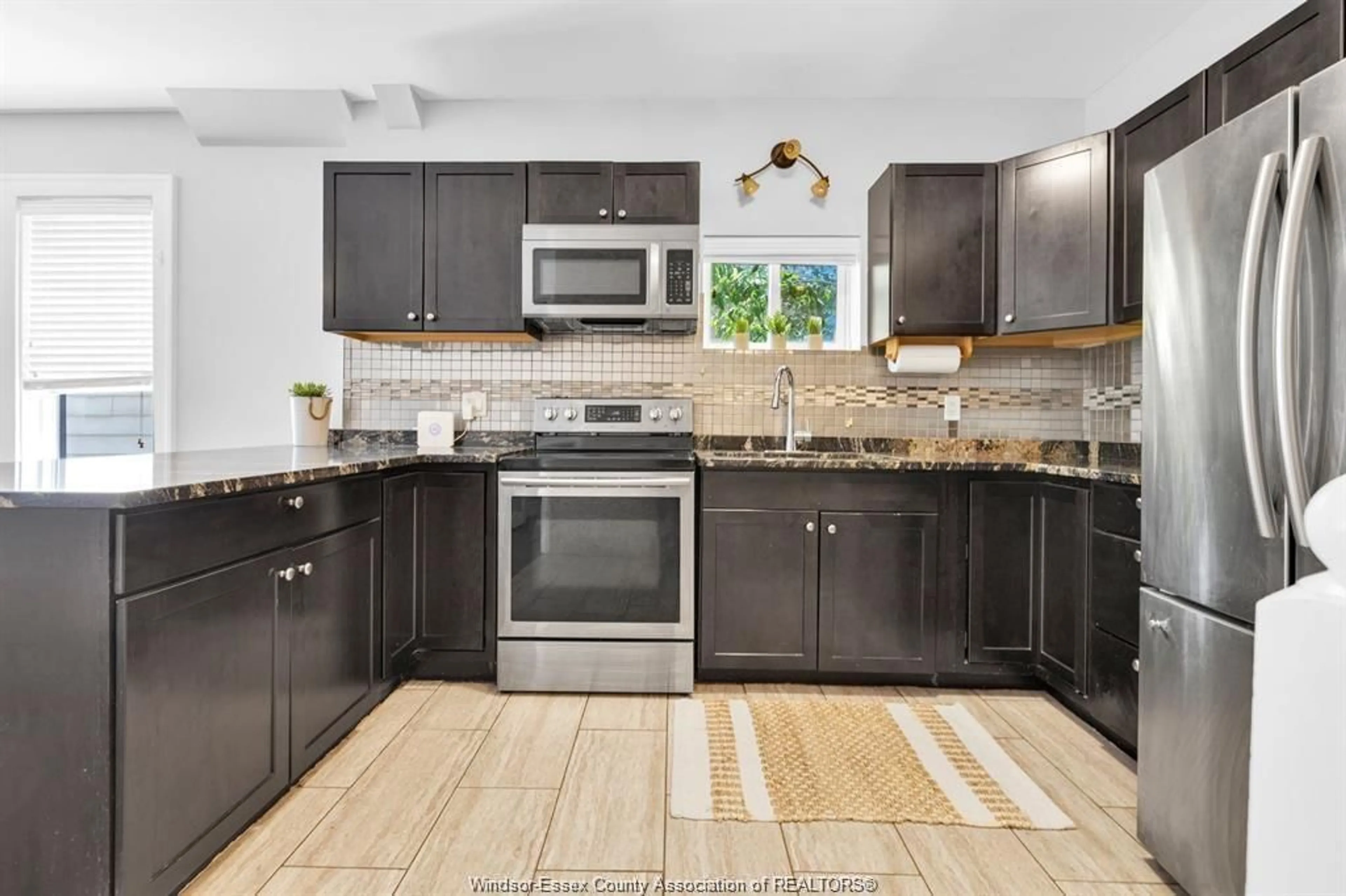 Open concept kitchen, ceramic/tile floor for 1341 McKay, Windsor Ontario N9B 2B1