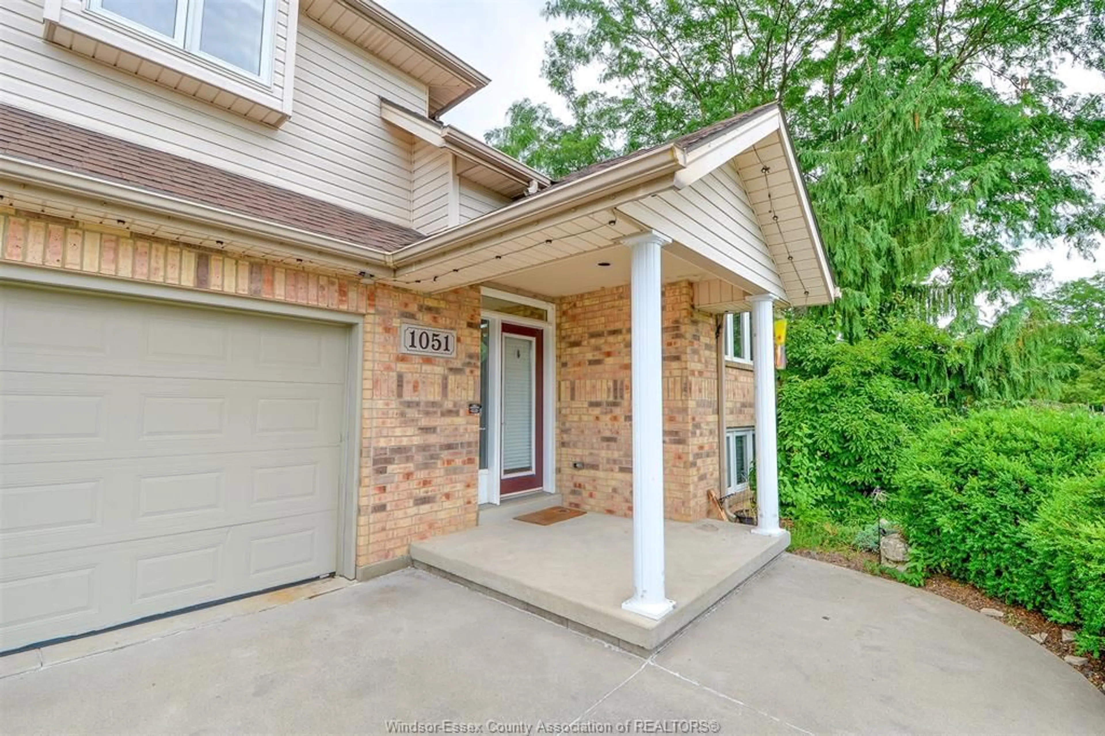 Home with brick exterior material, street for 1051 CORA GREENWOOD, Windsor Ontario N8P 1K2