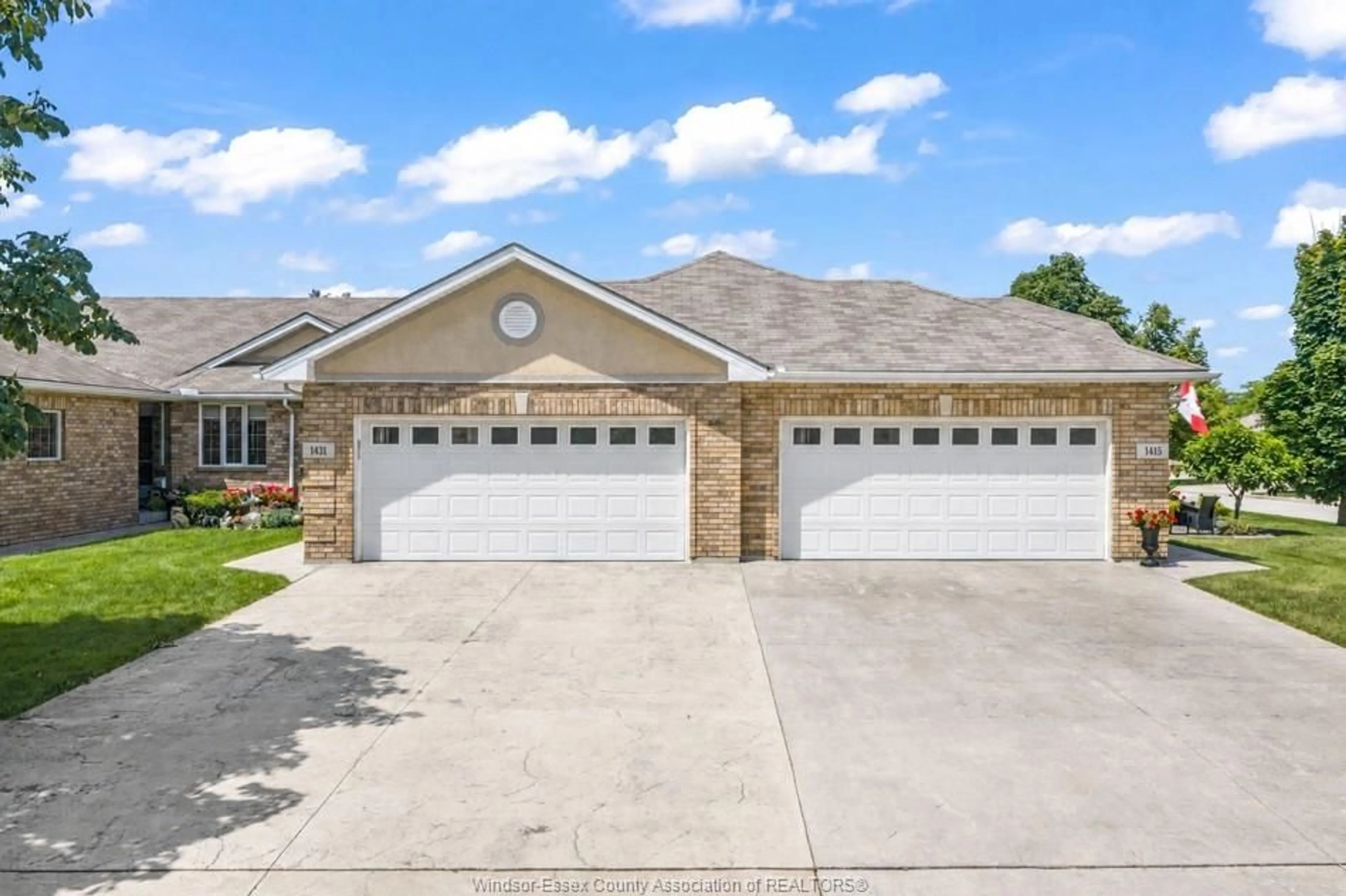 Home with brick exterior material, street for 1431 Blue Heron Dr, Windsor Ontario N8P 1L5