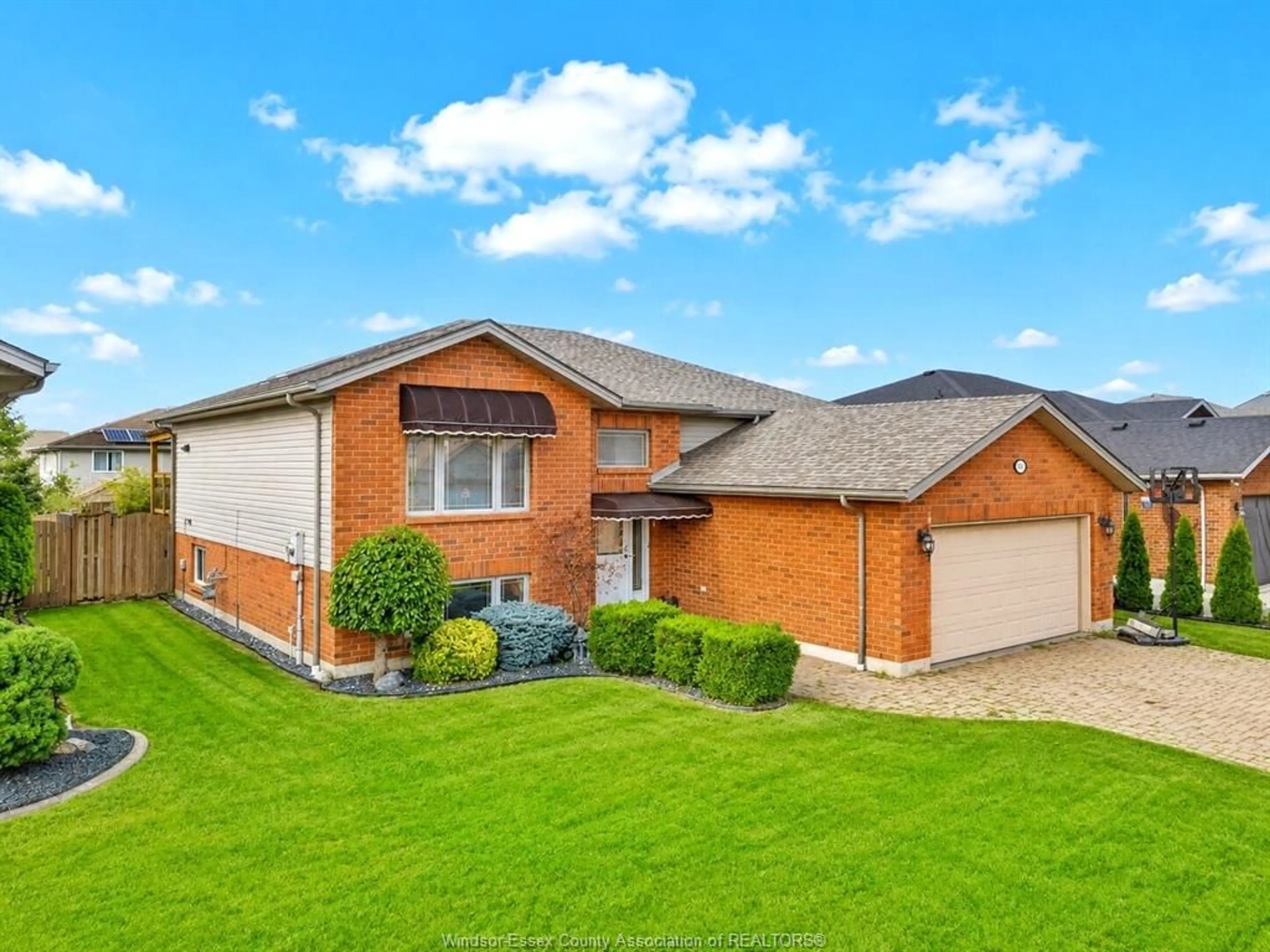A pic from outside/outdoor area/front of a property/back of a property/a pic from drone, street for 890 SOUTHWOOD Dr, Lakeshore Ontario N0R 1A0