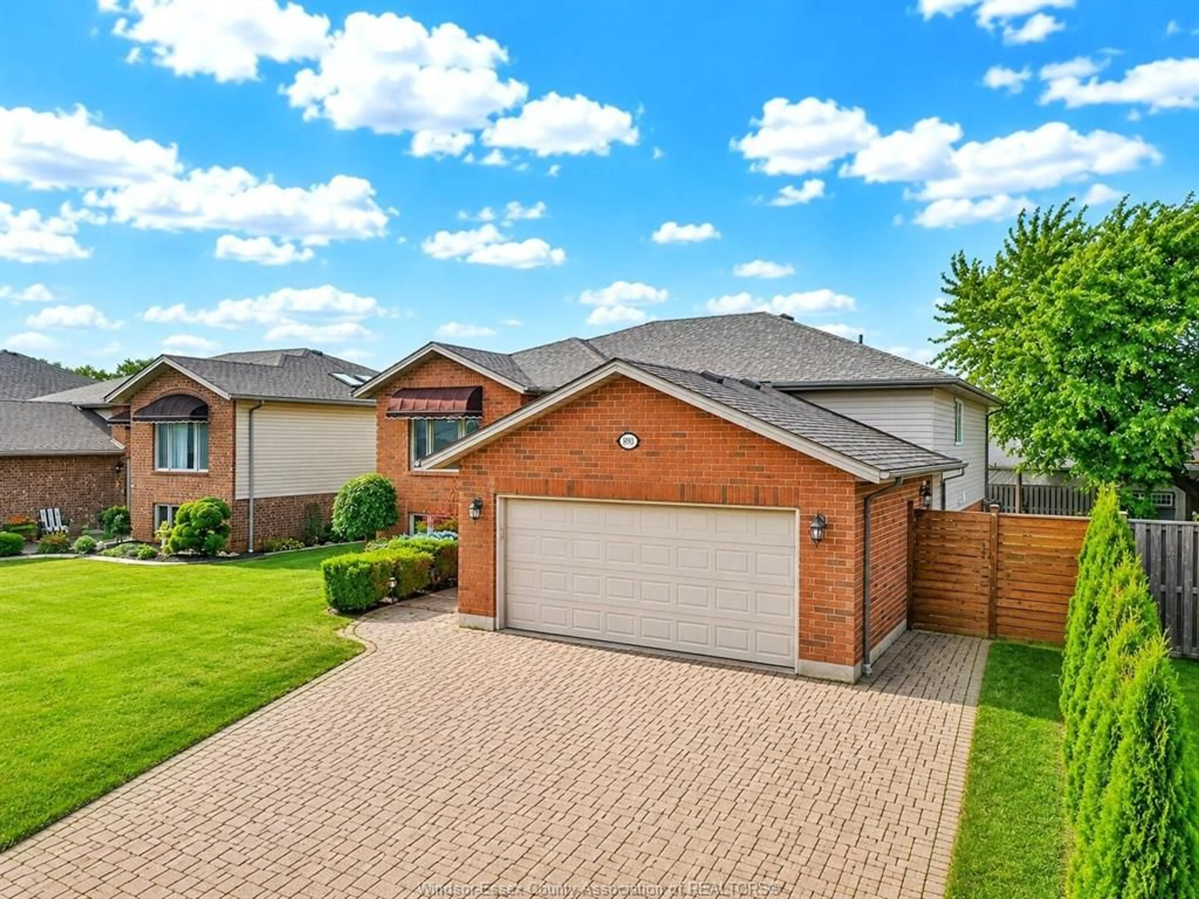 A pic from outside/outdoor area/front of a property/back of a property/a pic from drone, street for 890 SOUTHWOOD Dr, Lakeshore Ontario N0R 1A0