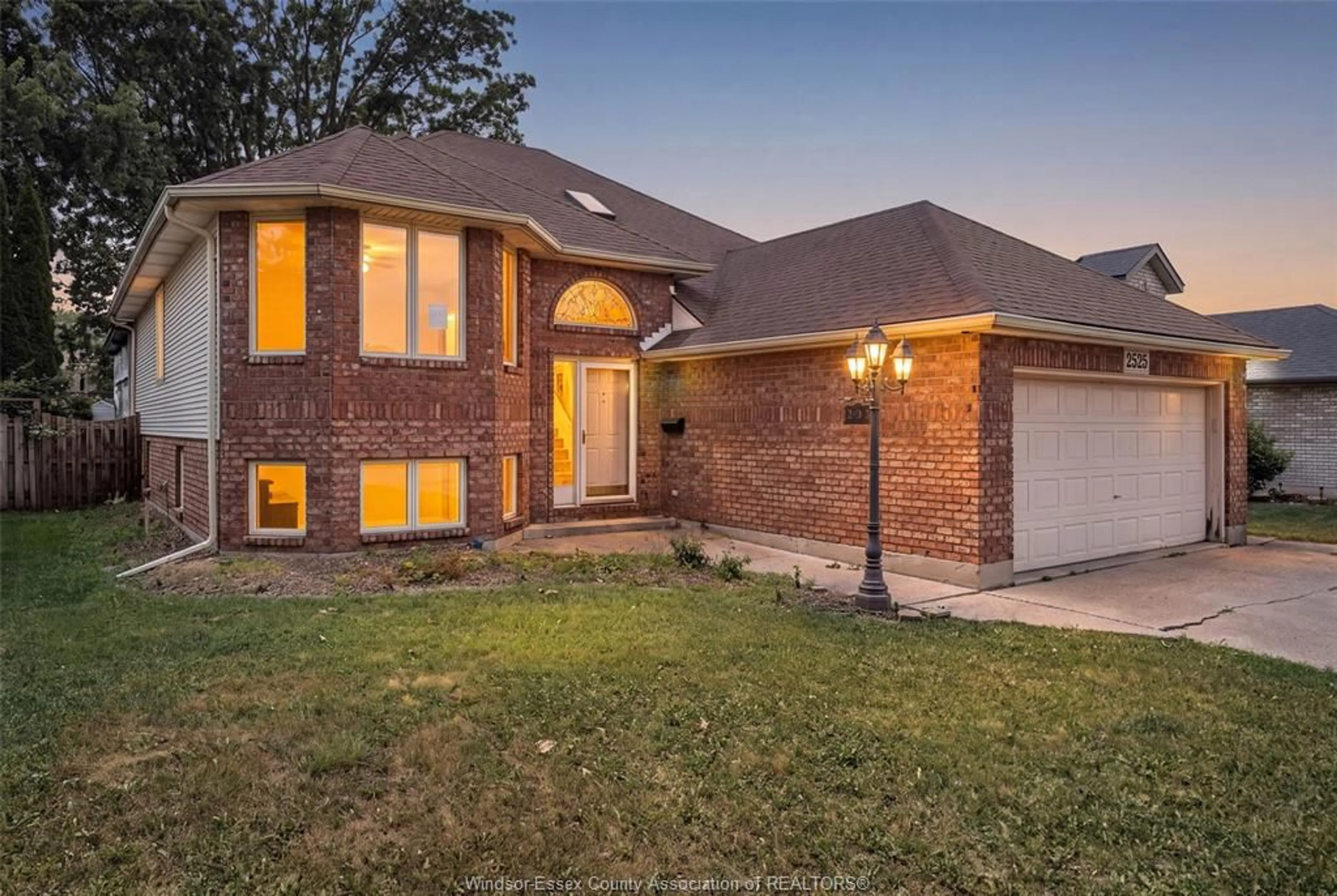 Home with brick exterior material, street for 2525 STRAWBERRY Dr, Tecumseh Ontario N9K 1C3