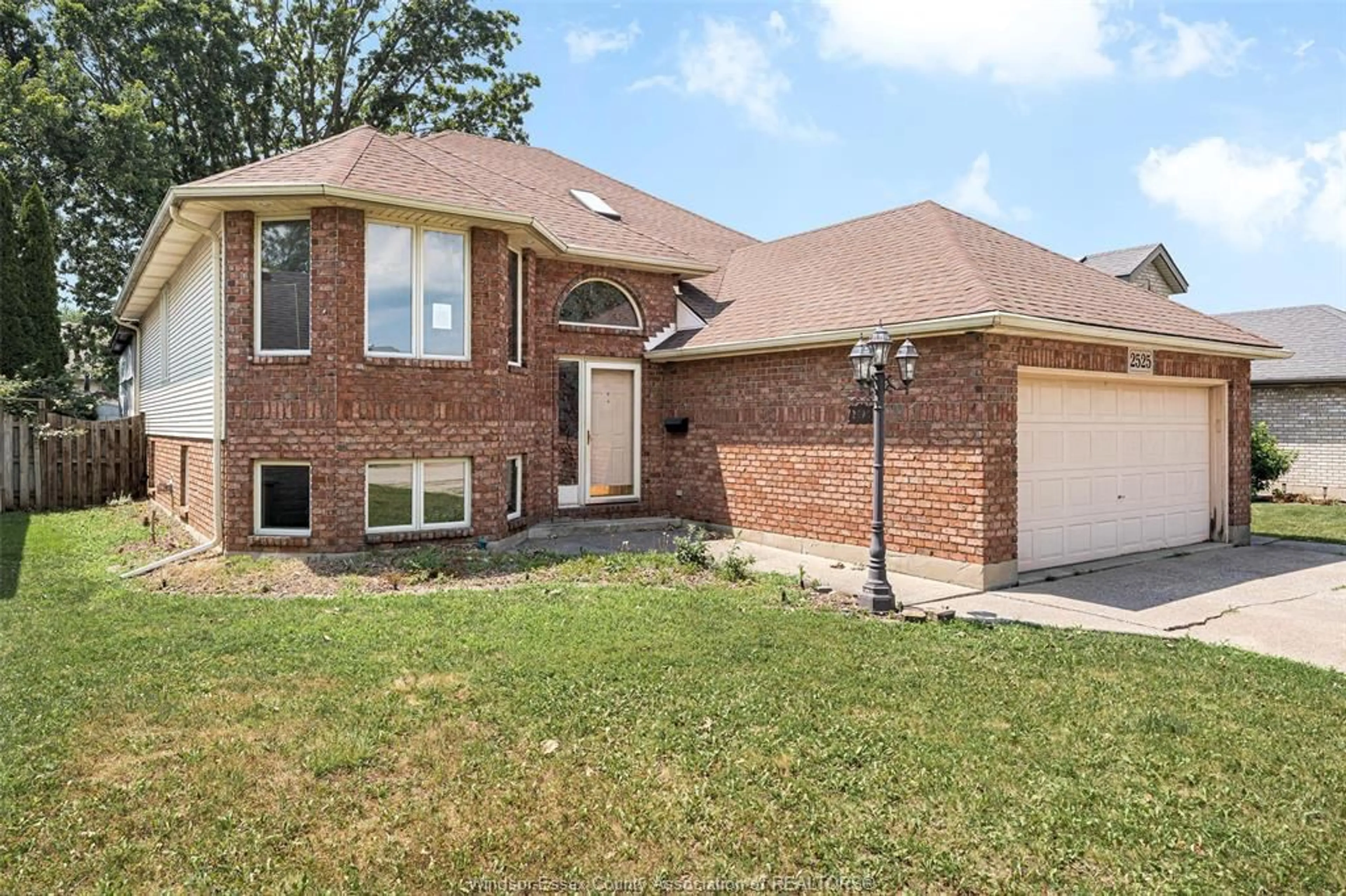 Home with brick exterior material, street for 2525 STRAWBERRY Dr, Tecumseh Ontario N9K 1C3