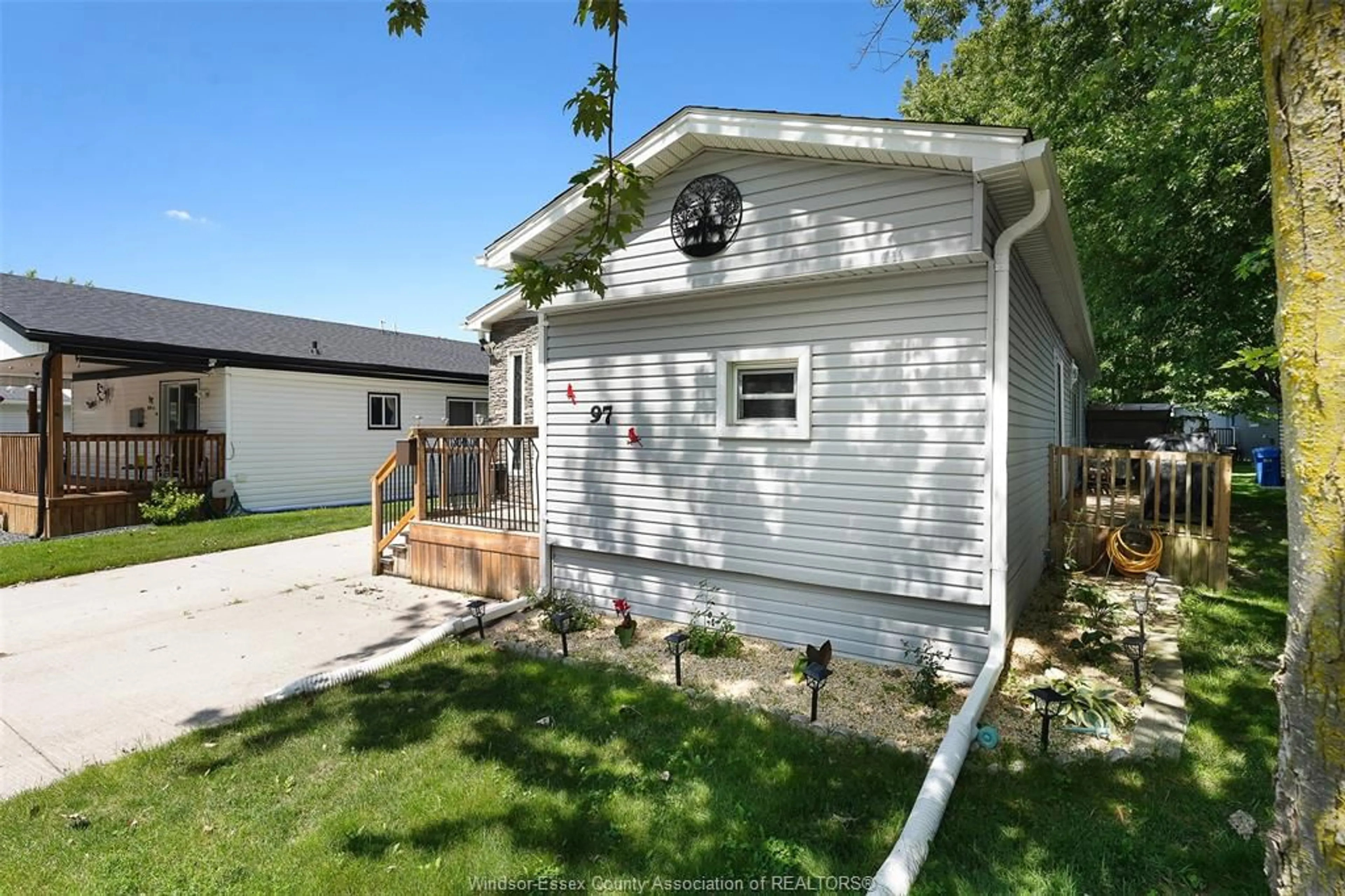 Home with vinyl exterior material, street for 97 Dana Dr, Essex Ontario N8M 1Z9