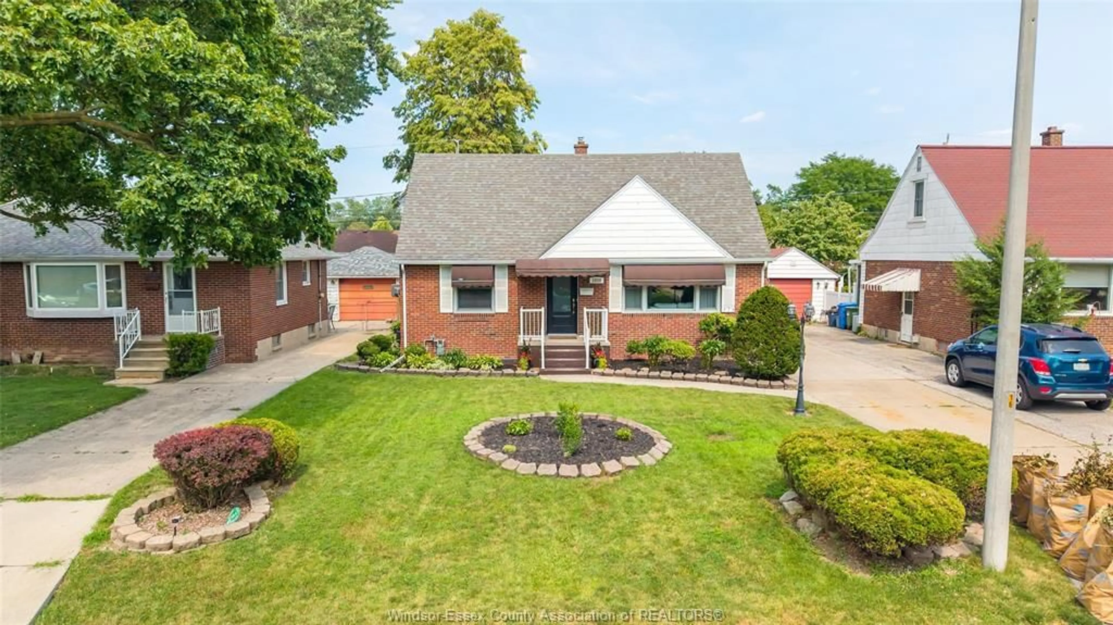 Home with brick exterior material, street for 1030 ISABELLE Pl, Windsor Ontario N8S 3B2