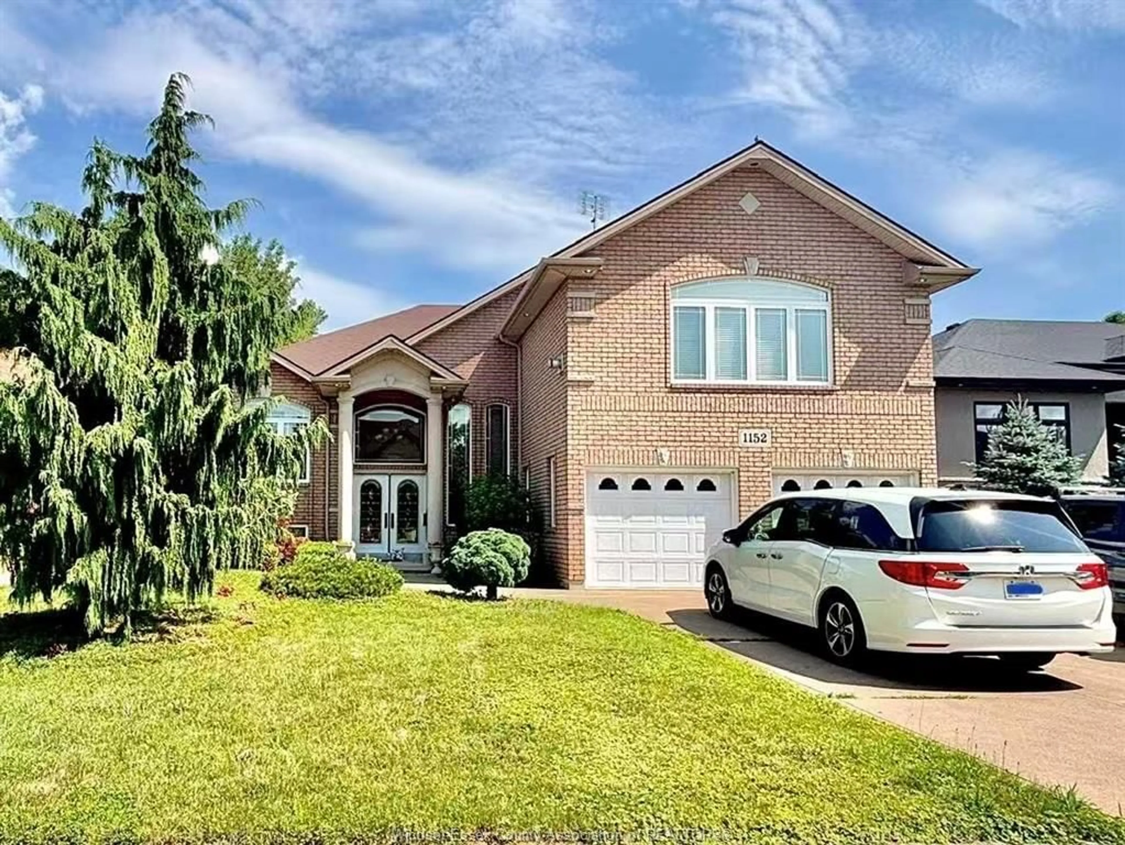Home with brick exterior material, street for 1152 JILLIAN Crt, Lakeshore Ontario N8L 0W8