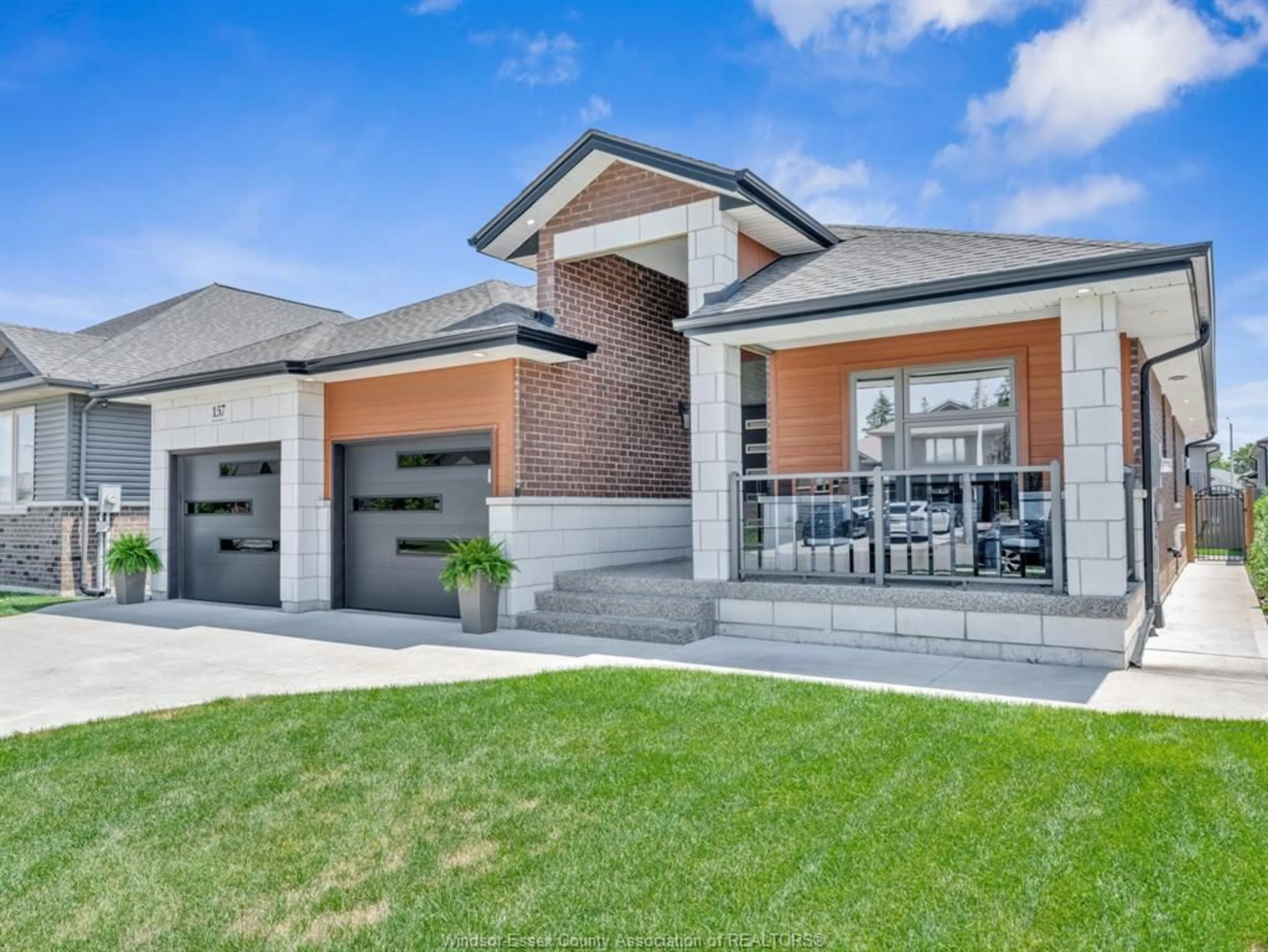 Home with brick exterior material, street for 157 TOWNSVIEW, Essex Ontario N8M 0A4
