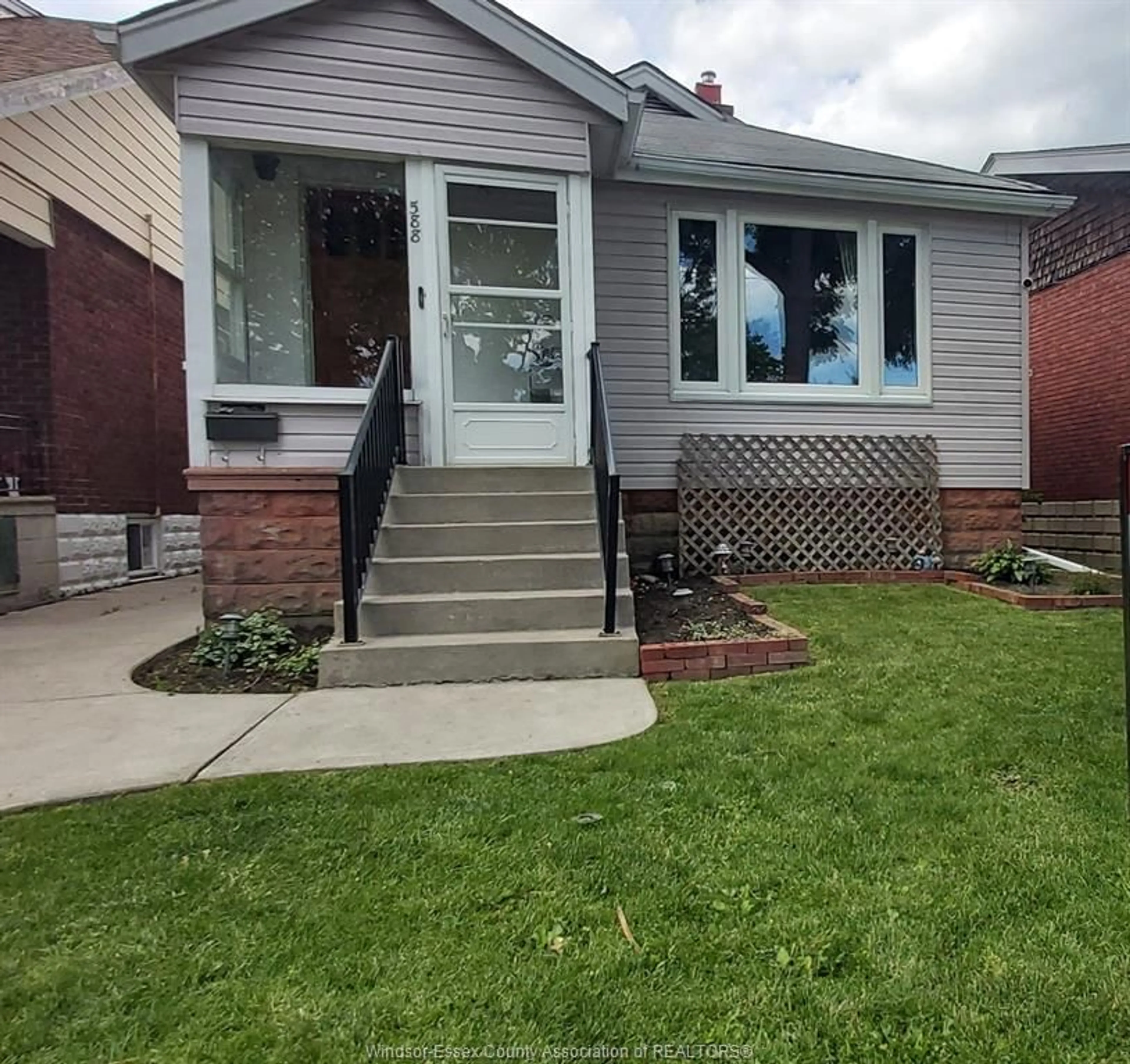 Home with brick exterior material, street for 588 IRVINE Ave, Windsor Ontario N8X 2T2