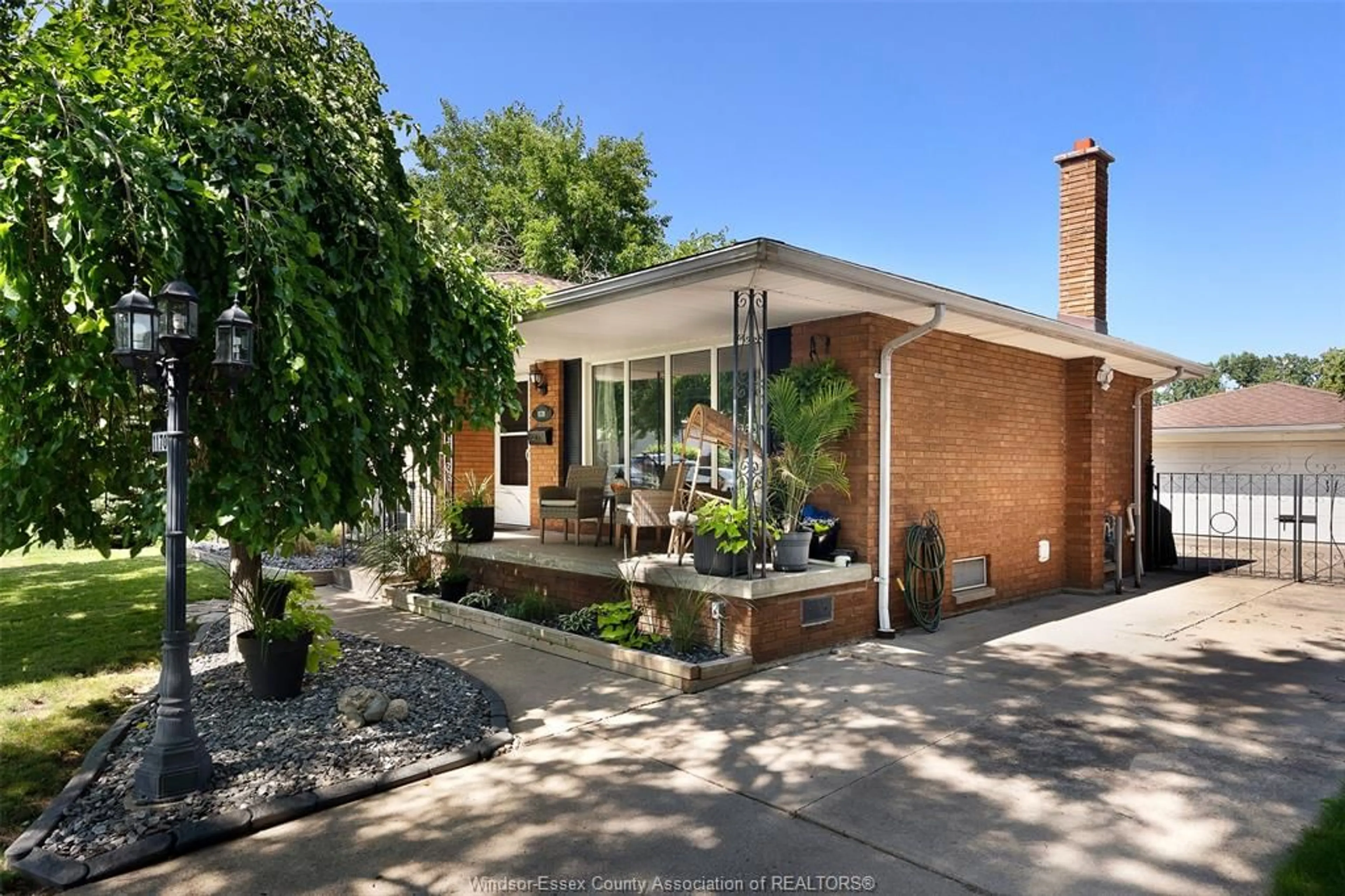 Home with brick exterior material, street for 1170 GARDEN COURT Dr, Windsor Ontario N8S 2S3