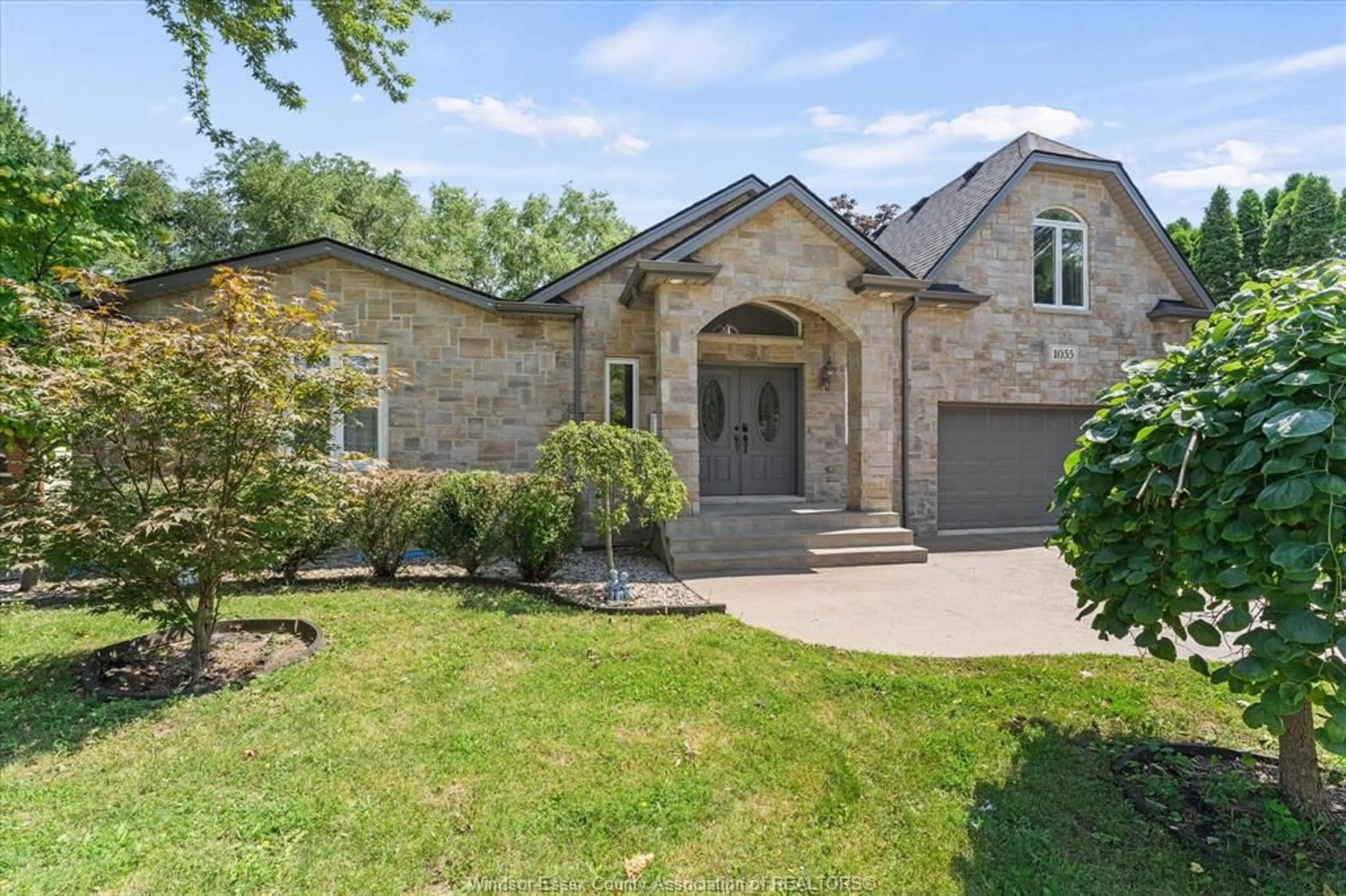 Home with brick exterior material, street for 1055 ROSELAND Dr, Windsor Ontario N9G 1T9
