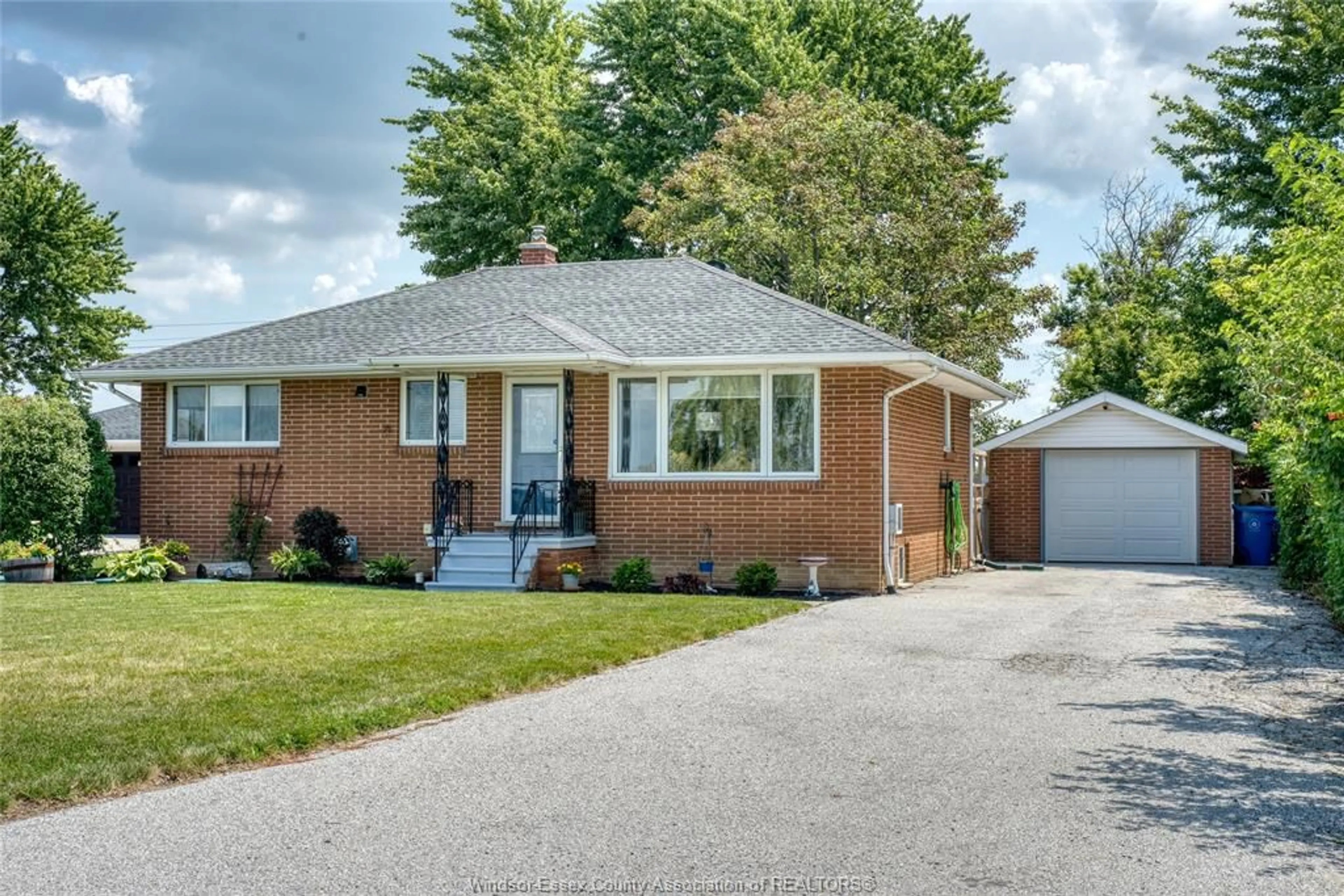 Home with brick exterior material, street for 14001 WALKER ROAD, Essex Ontario N0R 1J0