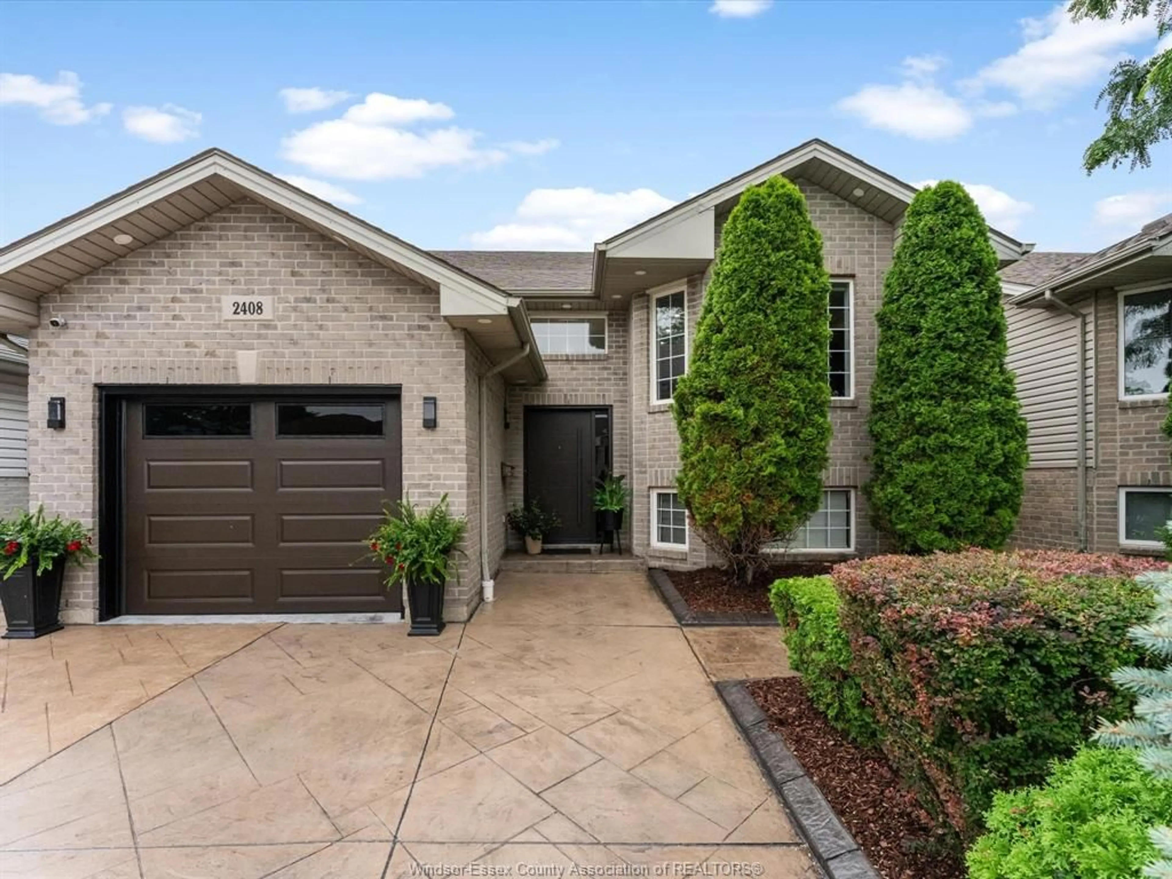 Home with brick exterior material, street for 2408 WATERFORD Ave, Windsor Ontario N8P 1S1