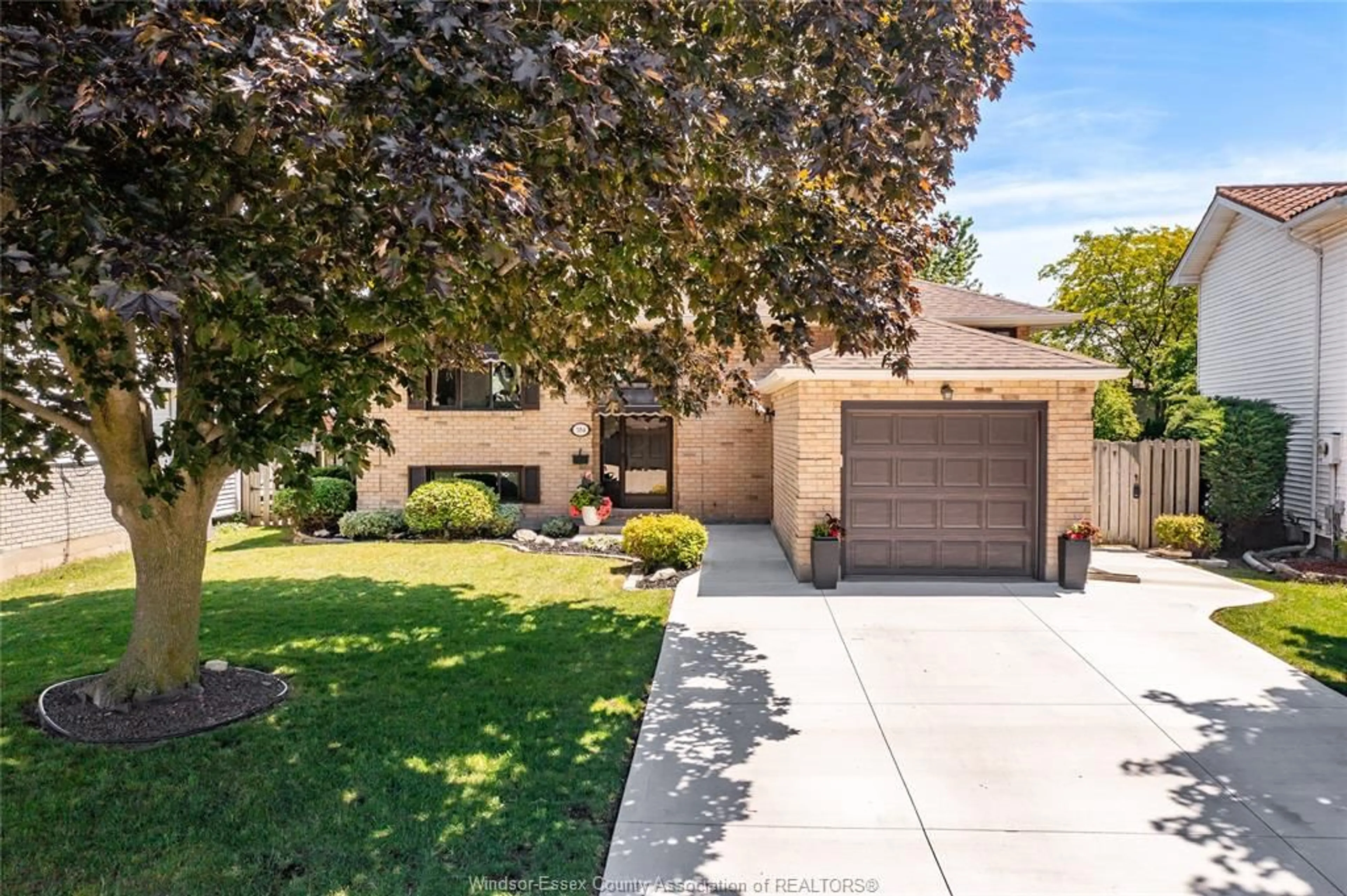 Home with brick exterior material, street for 384 AMBERLY Cres, Tecumseh Ontario N8N 3M3