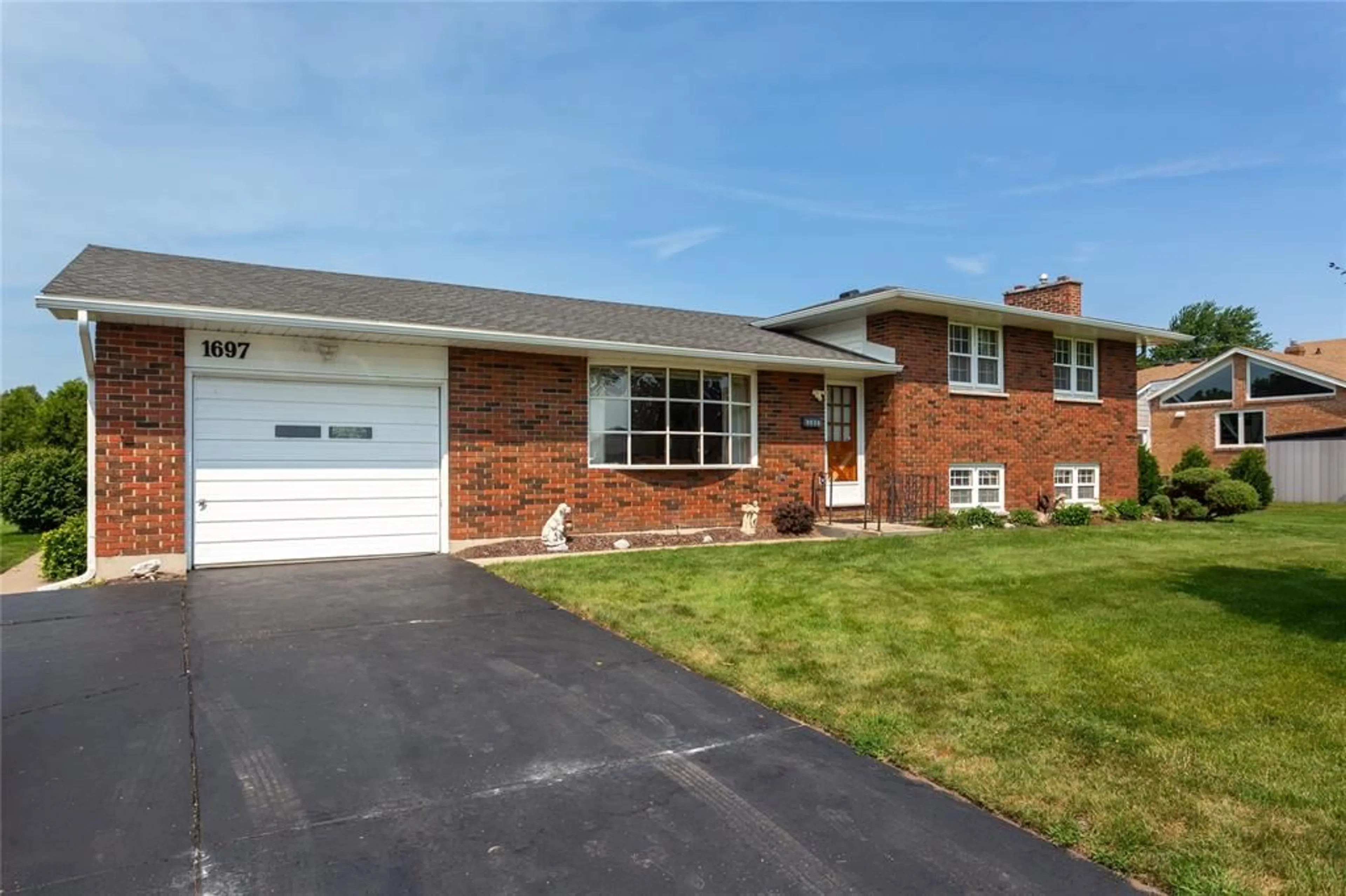 Home with brick exterior material, street for 1697 THURSTON Rd, Sarnia Ontario N7X 1A5