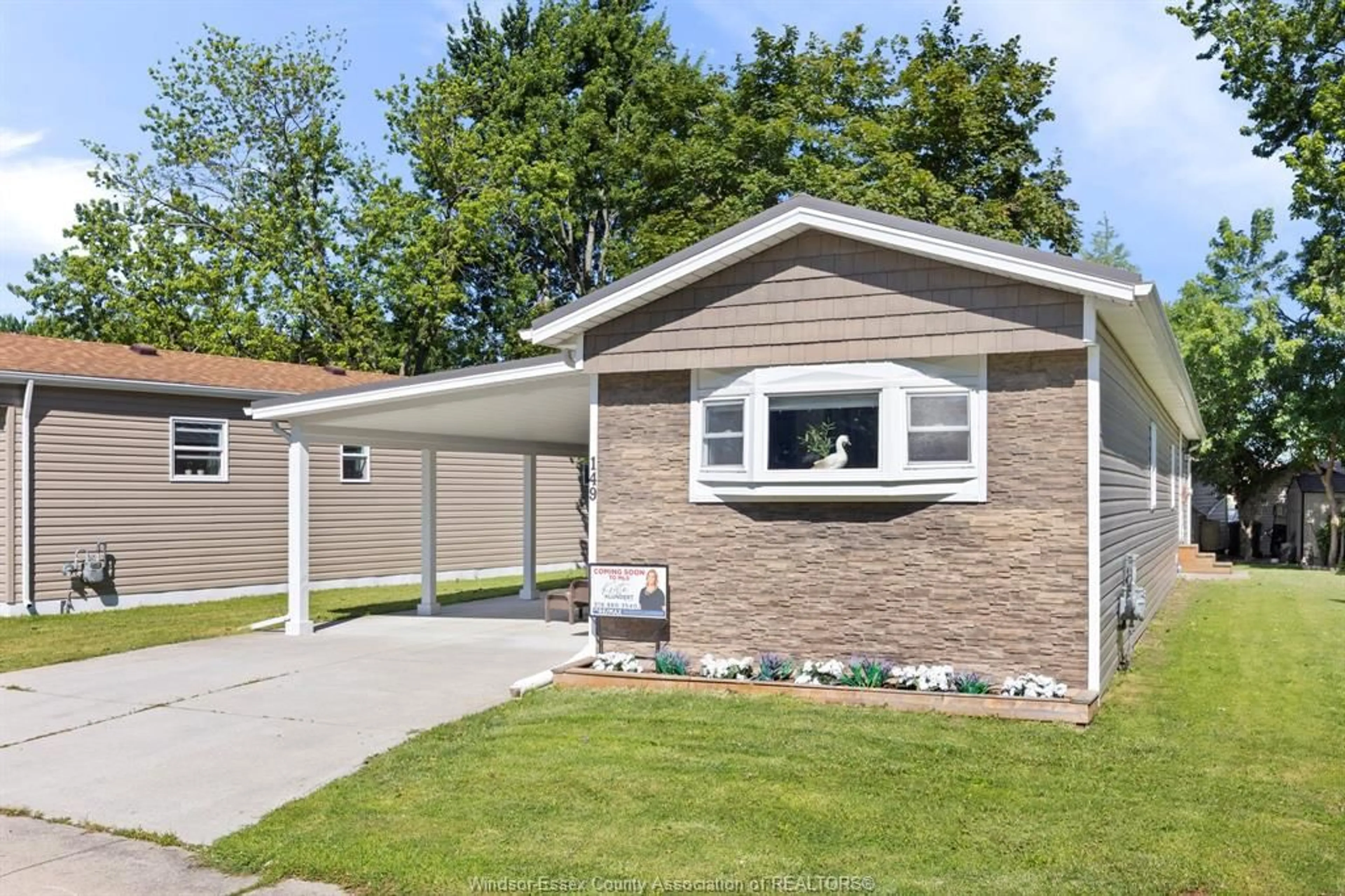 Home with vinyl exterior material, street for 149 DANA, Essex Ontario N8M 2A5