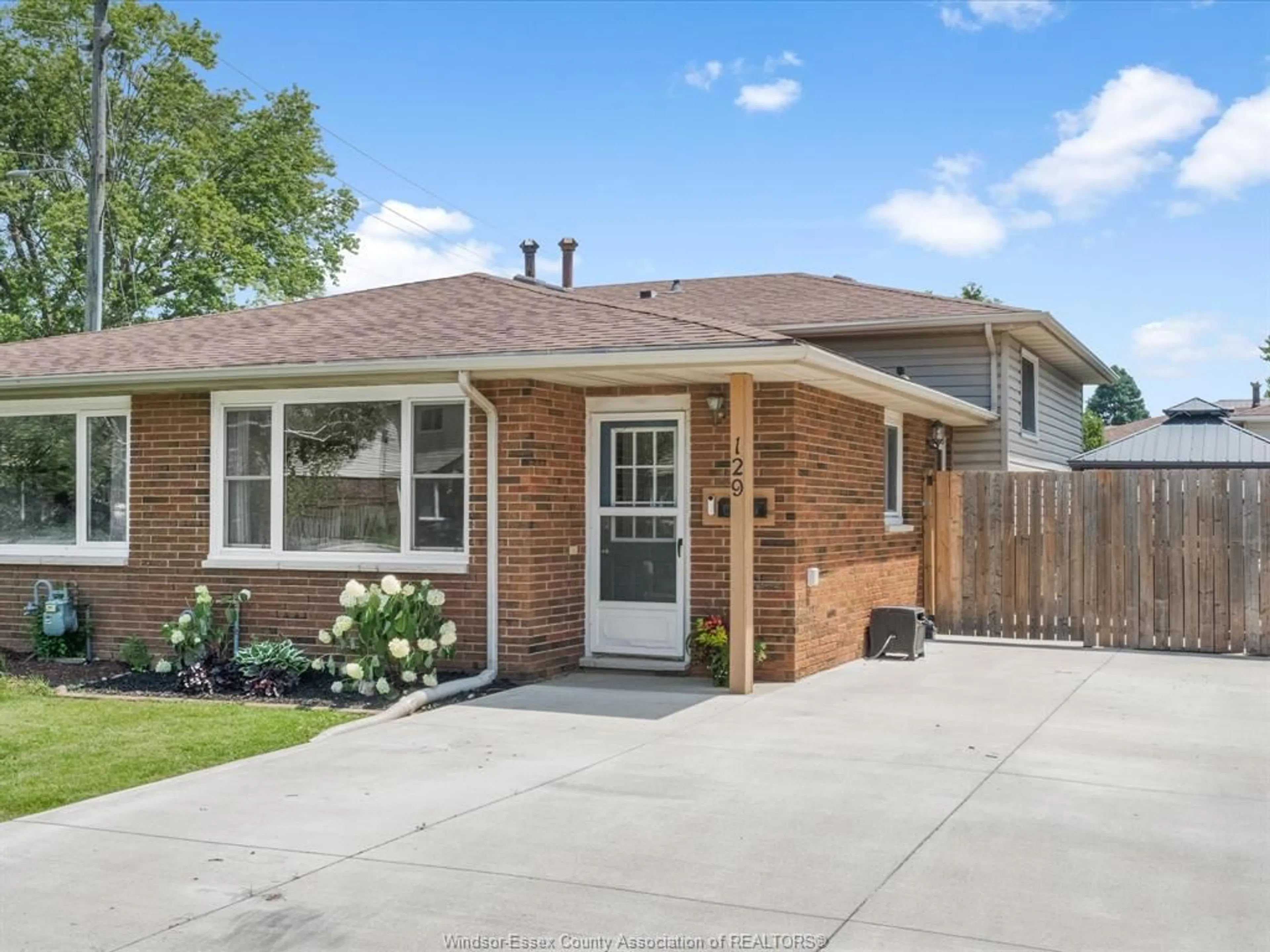 Home with brick exterior material, street for 129 Lansdowne Ave, Kingsville Ontario N9Y 1S4