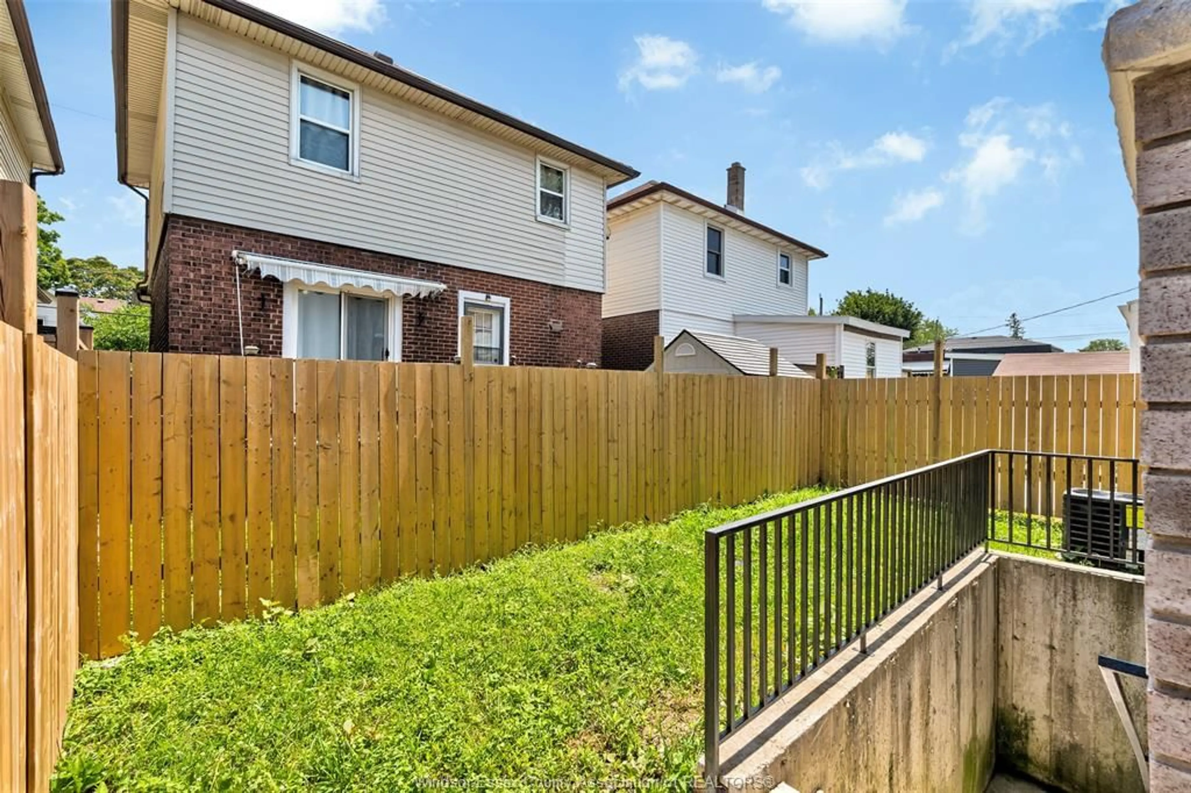 A pic from outside/outdoor area/front of a property/back of a property/a pic from drone, street for 1156 WELLINGTON, Windsor Ontario N9A 5K1