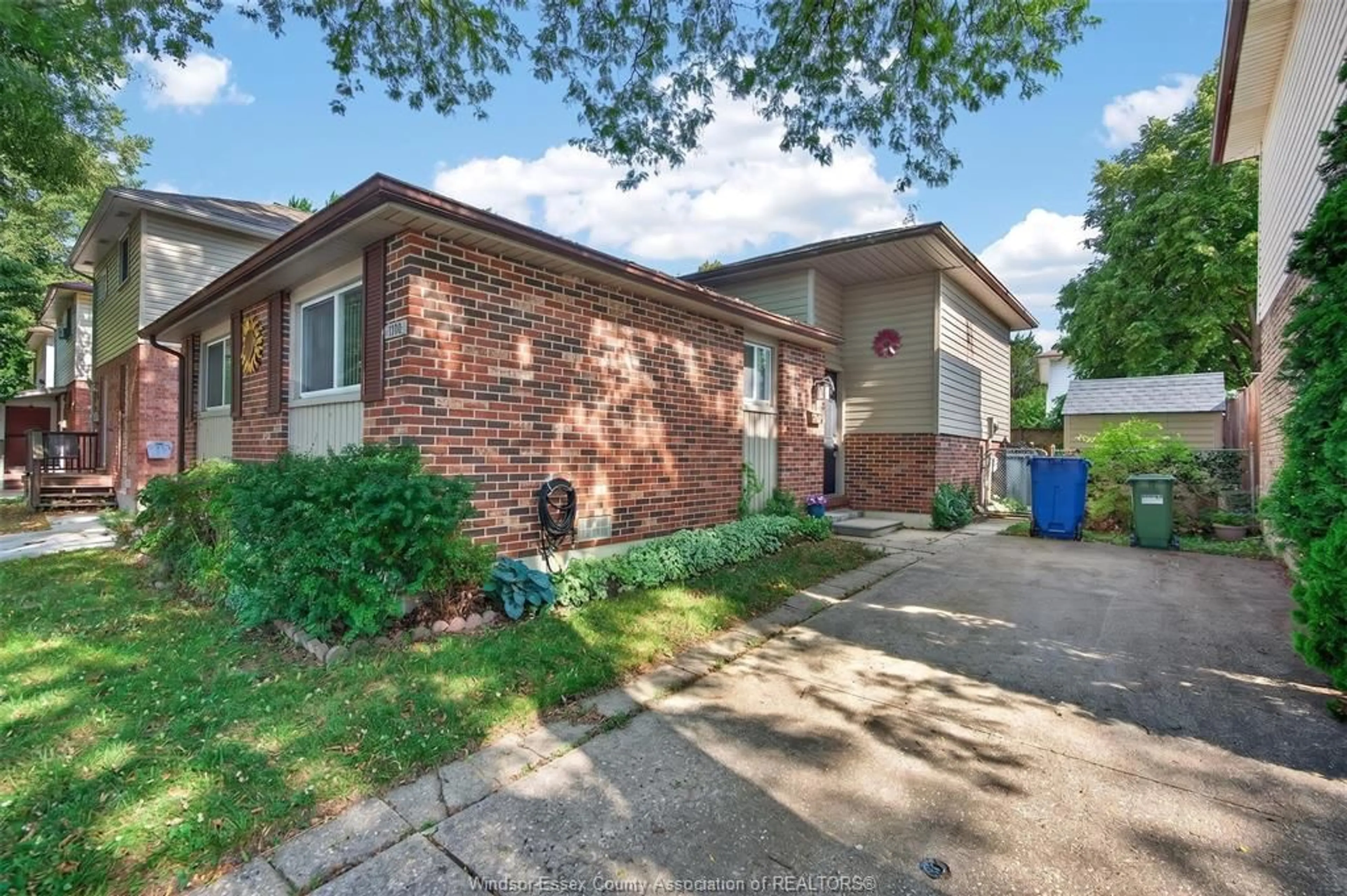 Home with brick exterior material, street for 1240 Arncliffe Pl, Windsor Ontario N8S 4K3