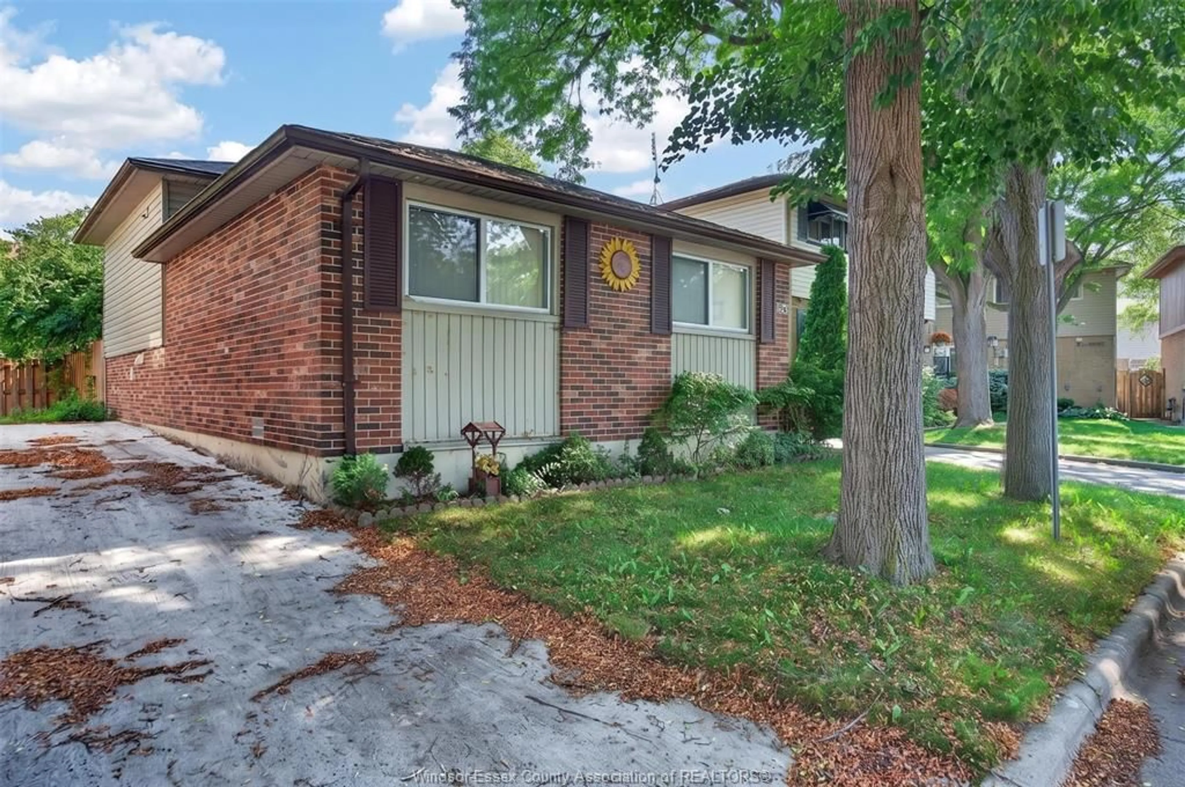 Home with brick exterior material, street for 1240 Arncliffe Pl, Windsor Ontario N8S 4K3
