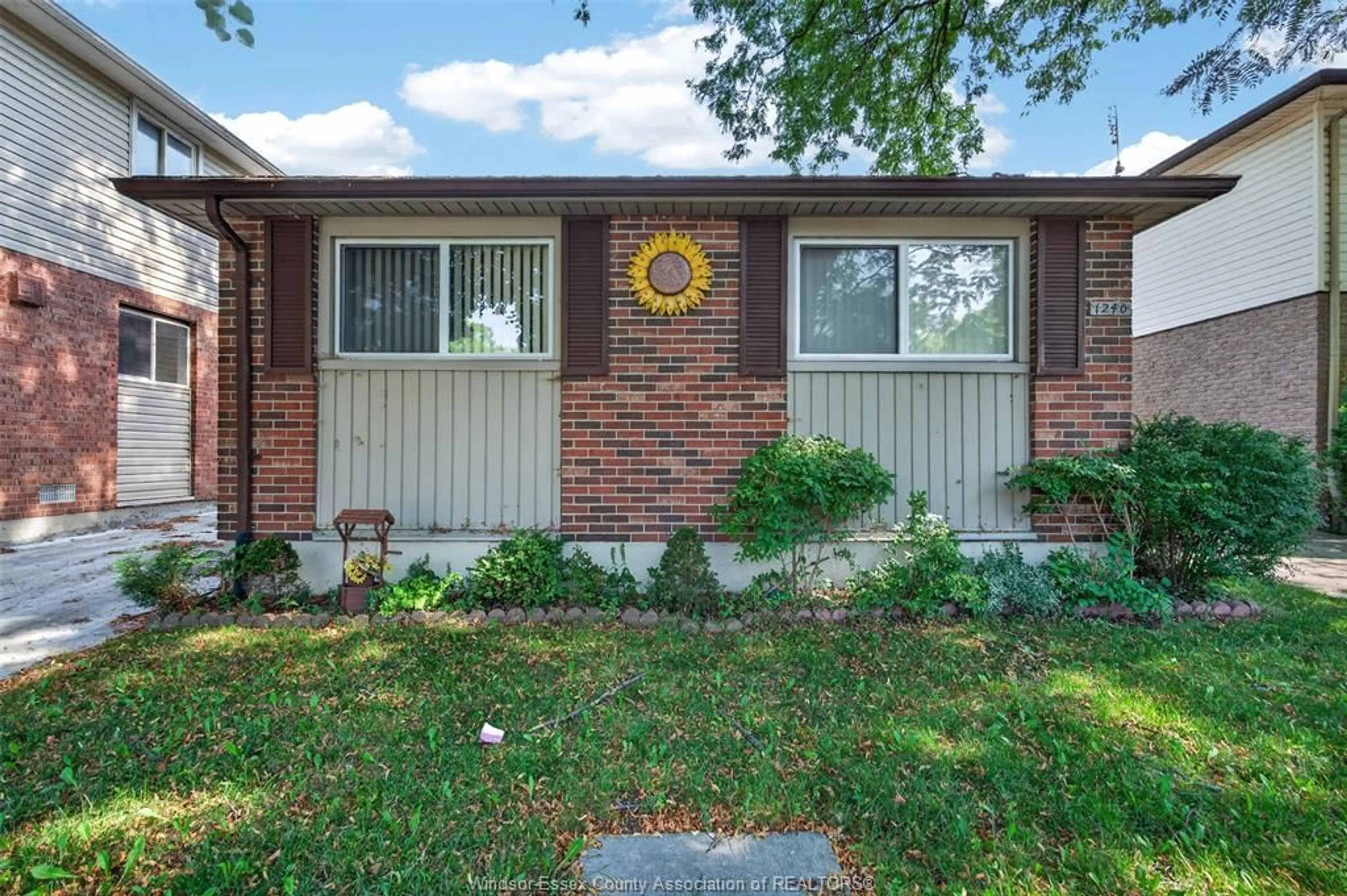 Home with brick exterior material, street for 1240 Arncliffe Pl, Windsor Ontario N8S 4K3