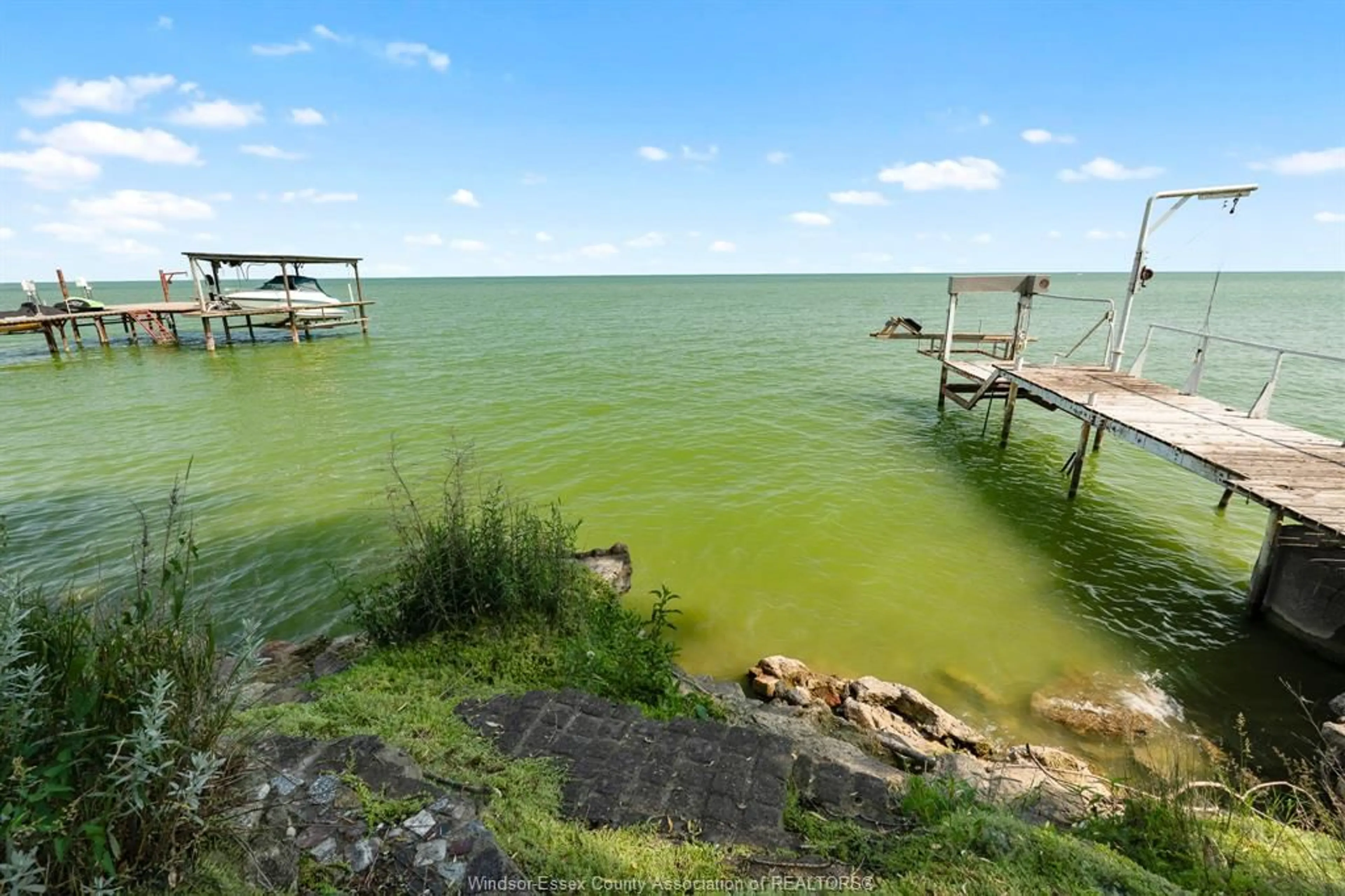A pic from outside/outdoor area/front of a property/back of a property/a pic from drone, water/lake/river/ocean view for 329 Lakeview Dr, Belle River Ontario N8L 0M2