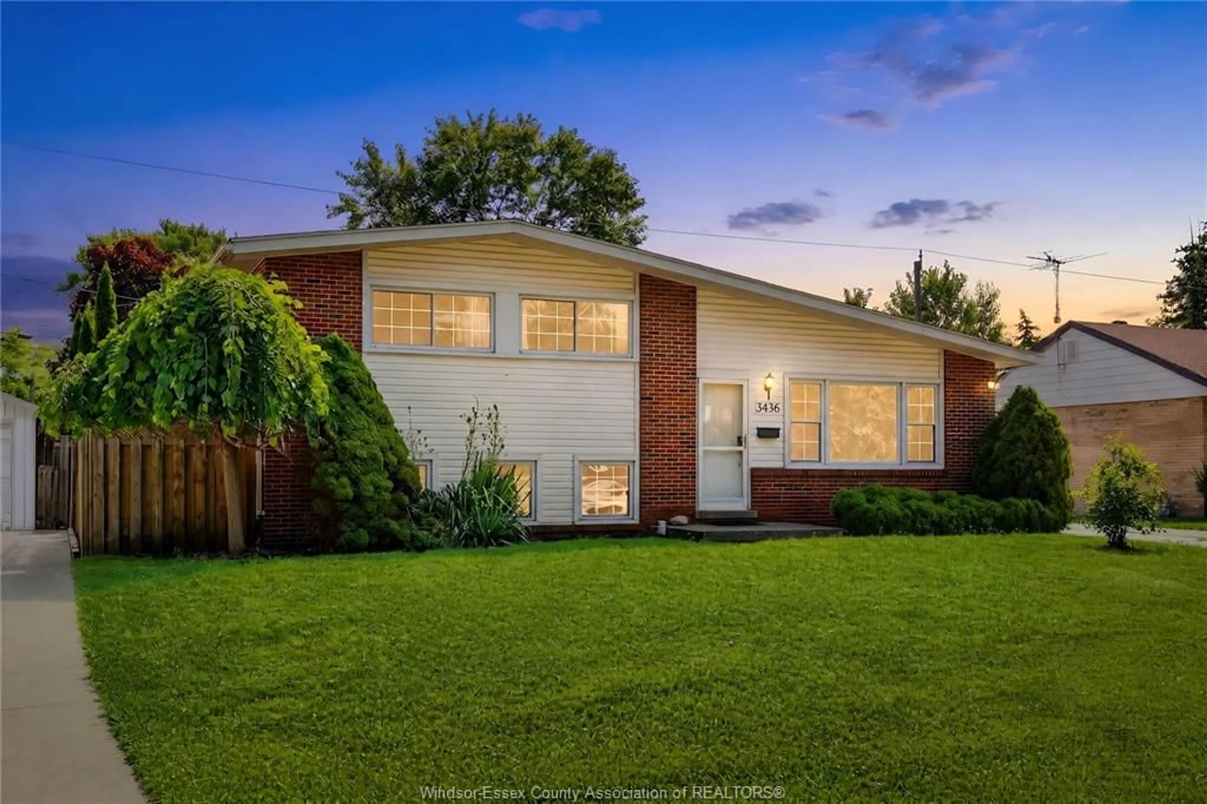 Home with brick exterior material, street for 3436 Glenwood Drive Ave, Windsor Ontario N9E 2Y5