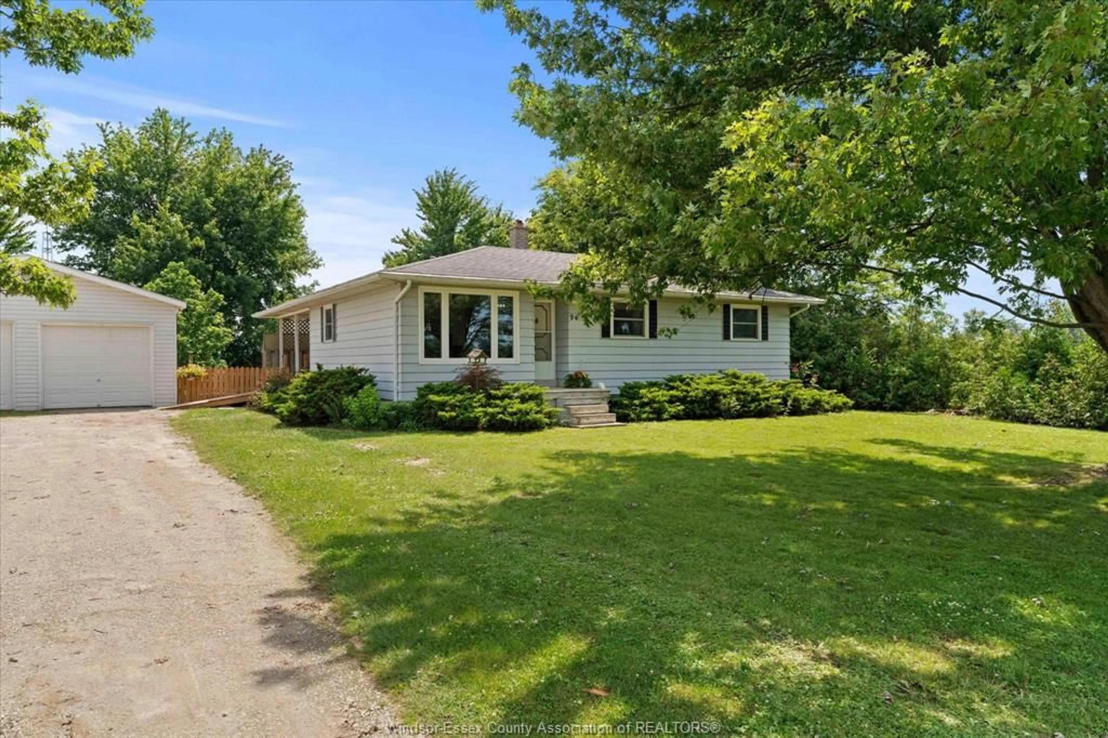 A pic from outside/outdoor area/front of a property/back of a property/a pic from drone, street for 94 Road 11, Gosfield North Ontario N0R 1V0
