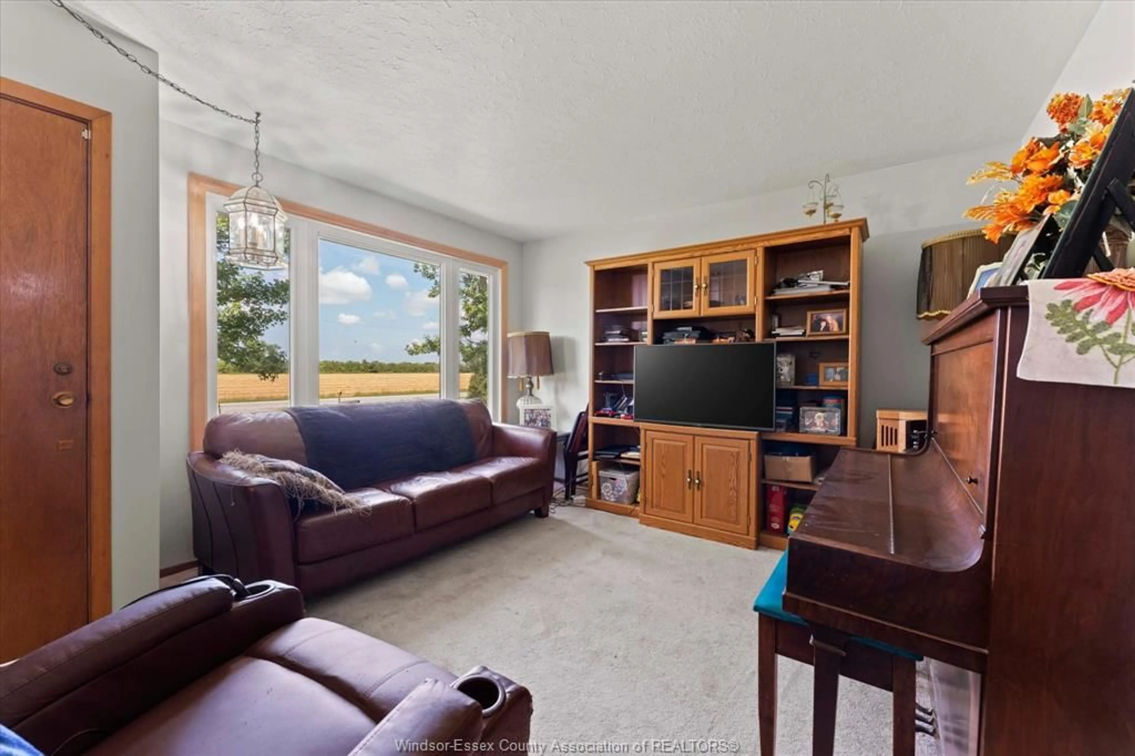 Living room with furniture, unknown for 94 Road 11, Gosfield North Ontario N0R 1V0